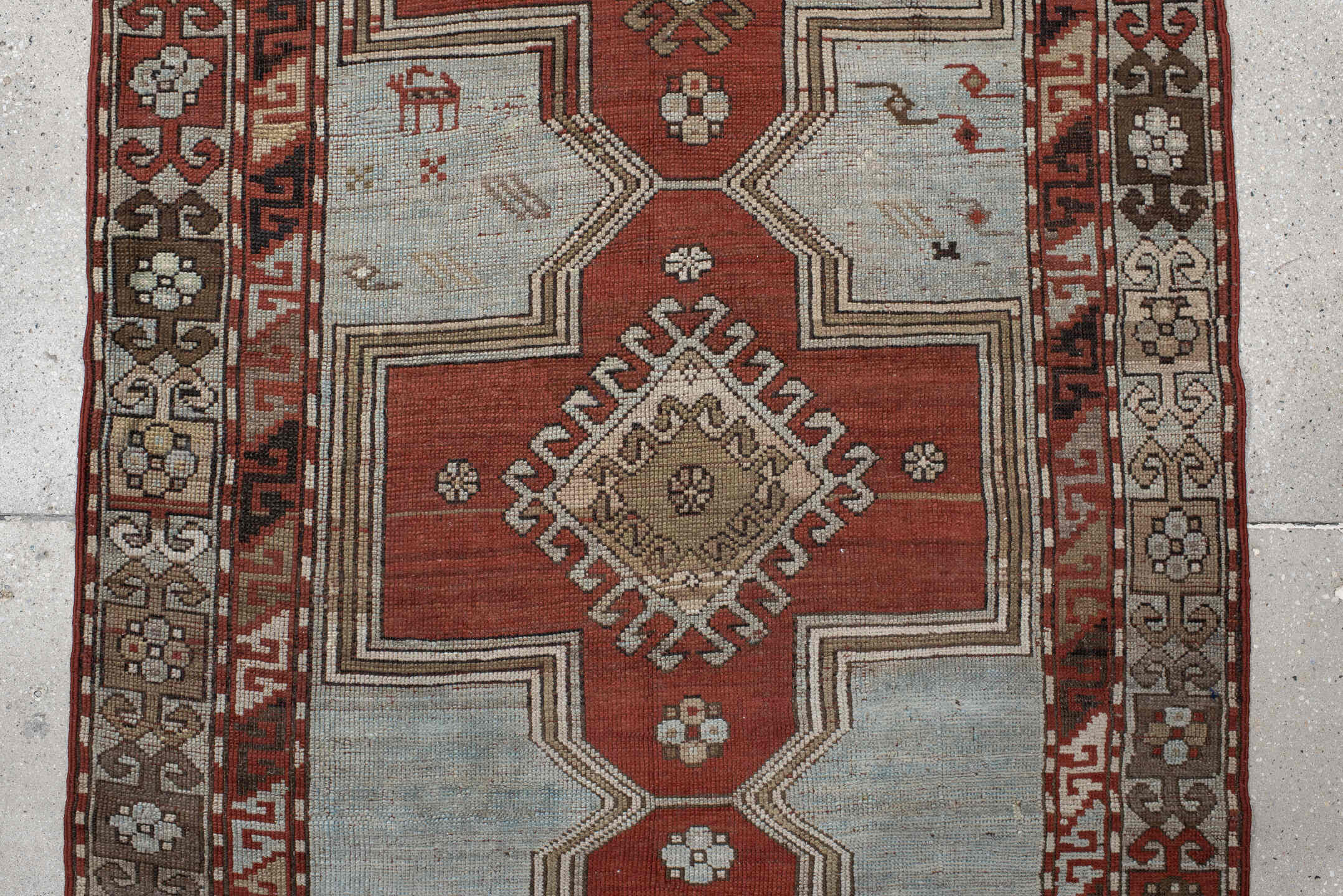 3' x 8' one-of-a-kind handmade vintage Caucasian runner rug. Color palette: ivory, rust, taupe, brown, crimson, charcoal