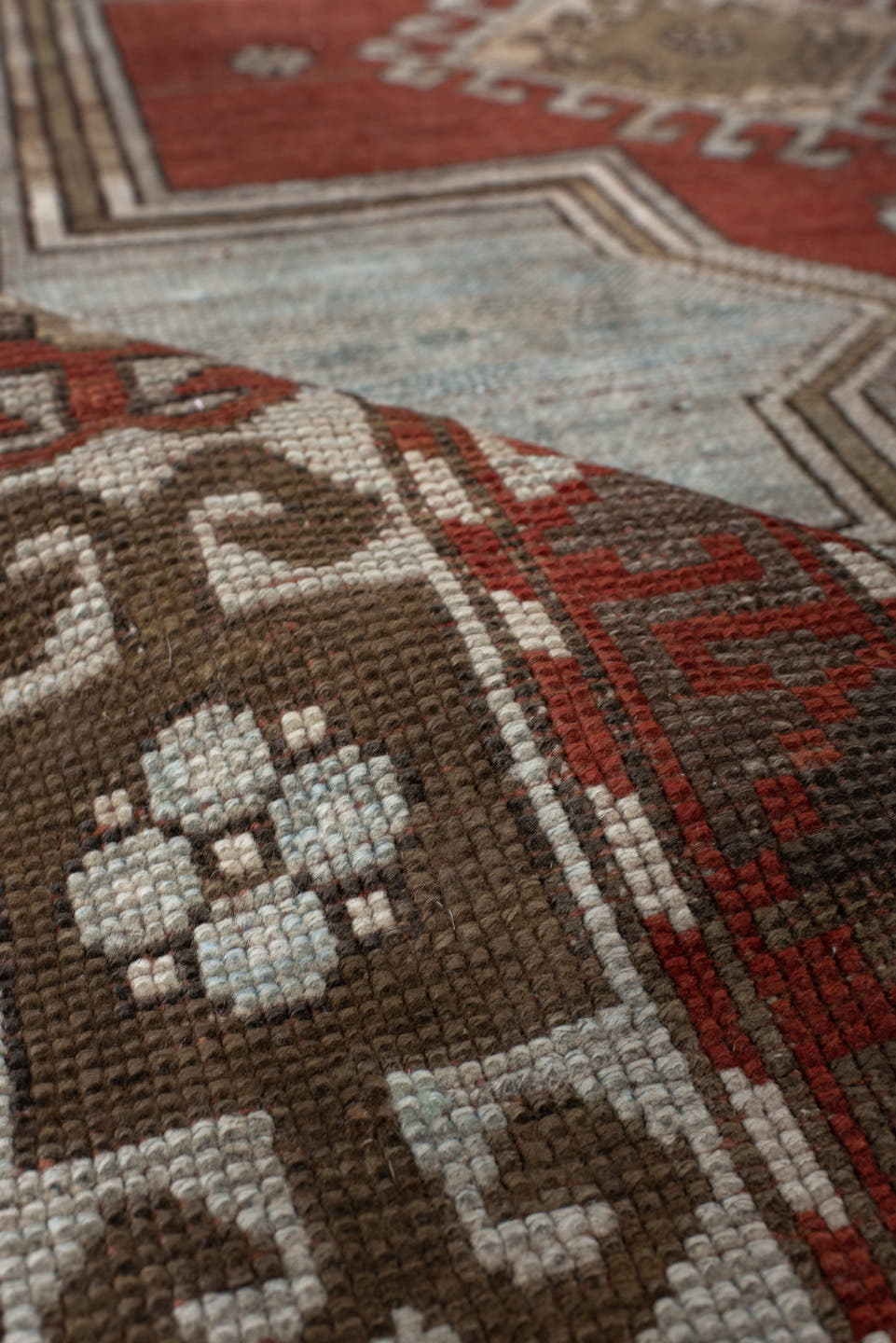 3' x 8' one-of-a-kind handmade vintage Caucasian runner rug. Color palette: ivory, rust, taupe, brown, crimson, charcoal