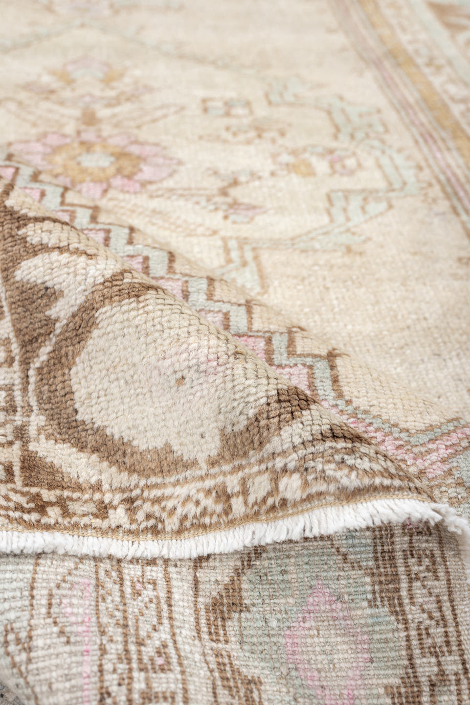 2' x 4' one-of-a-kind handmade antique Anatolian small size rug. Color palette: ivory, camel, pale blue, blush, taupe, beige
