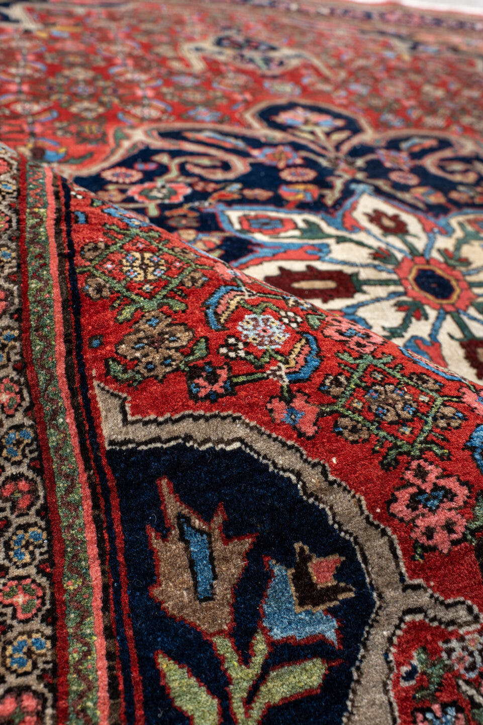 4' x 6' one-of-a-kind handmade antique Bidjar small size rug. Color palette: rust, navy, ivory, sky blue, rose, camel, sage