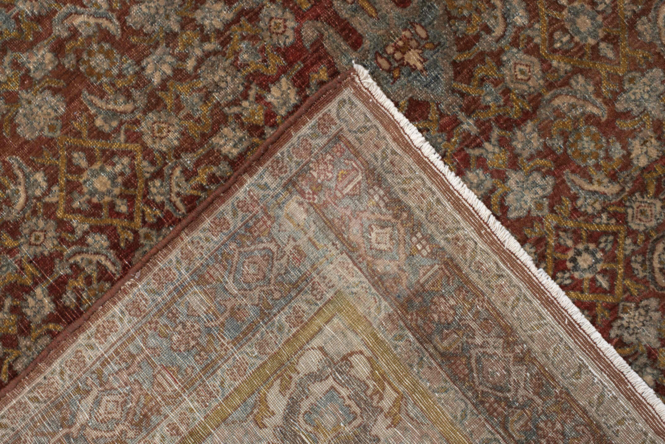 4' x 7' one-of-a-kind handmade vintage Bidjar rug. Color palette: rust, ivory, pale blue, taupe, rose, gold, brown