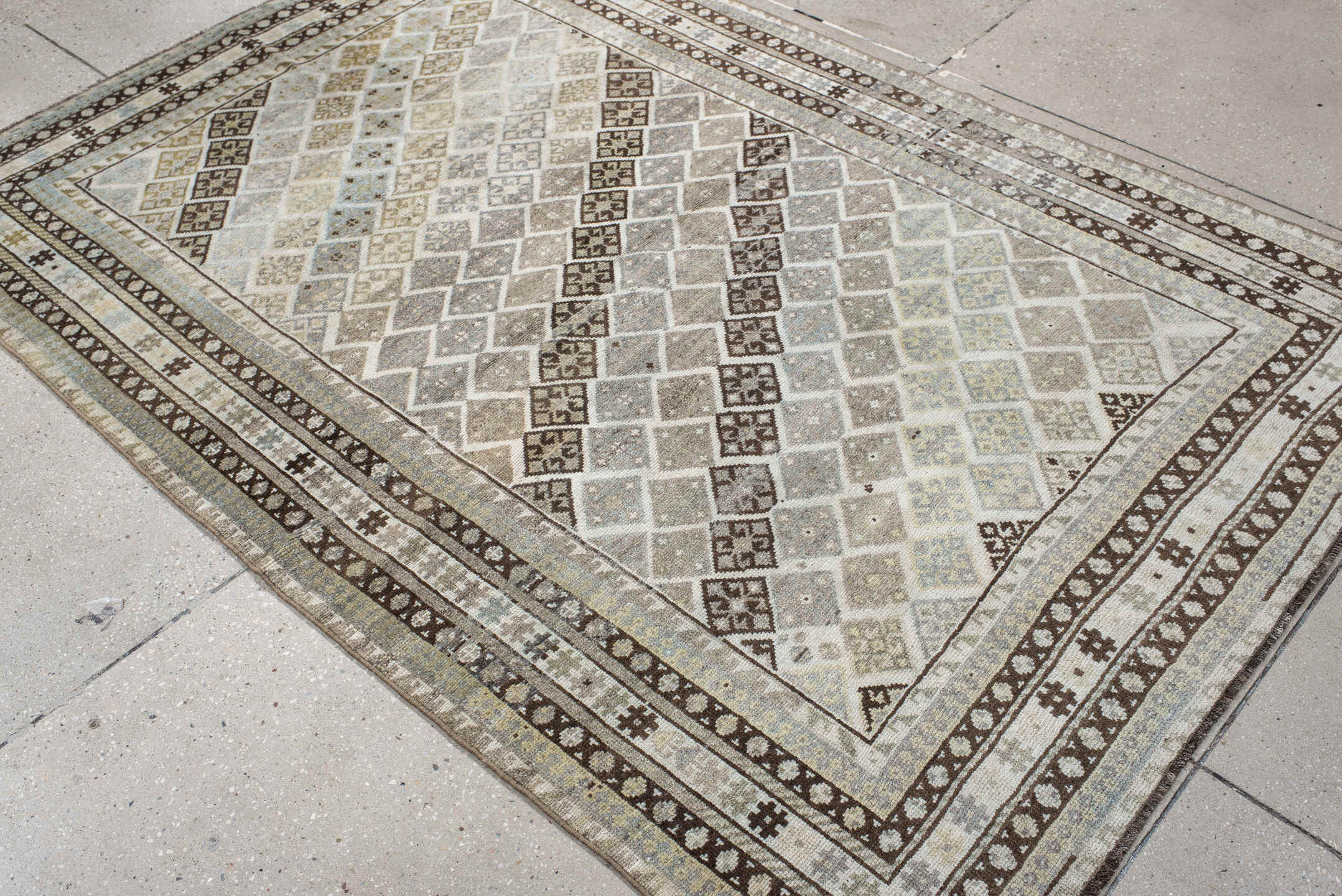 4' x 6' one-of-a-kind handmade vintage Gabbe small size rug. Color palette: ivory, taupe, brown, pale blue, beige, camel