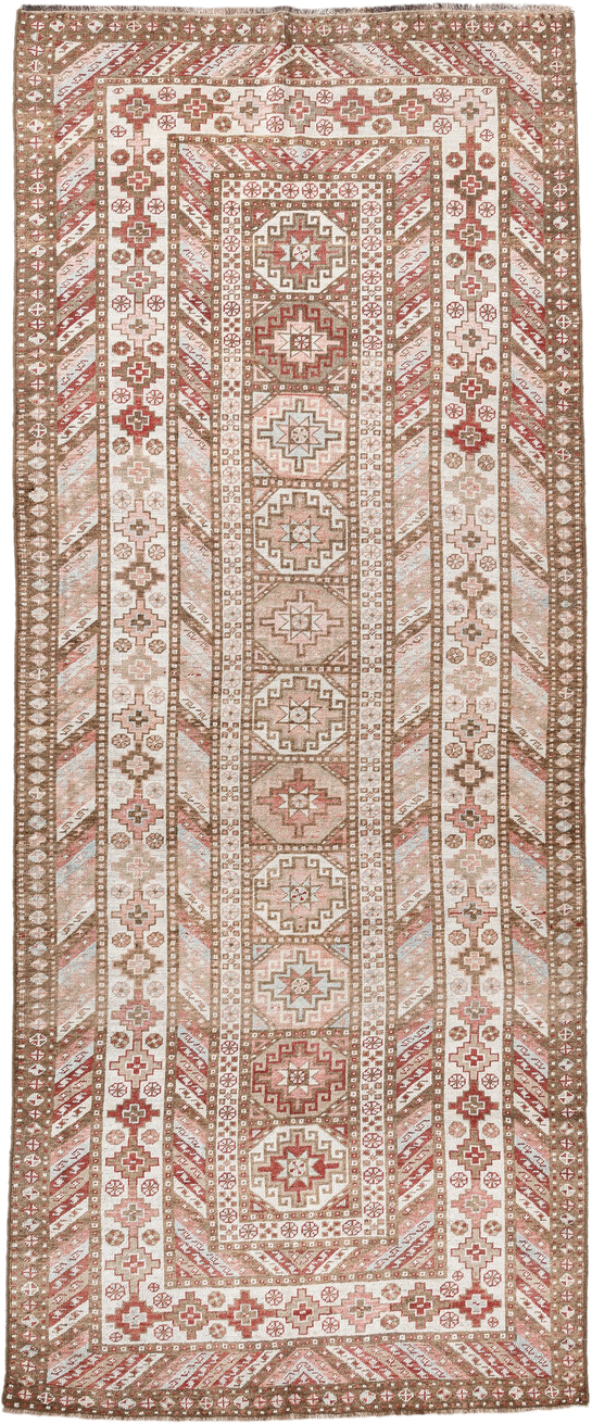 4' x 10' one-of-a-kind handmade antique Caucasian runner rug. Color palette: ivory, taupe, rose, rust, camel, brown, beige
