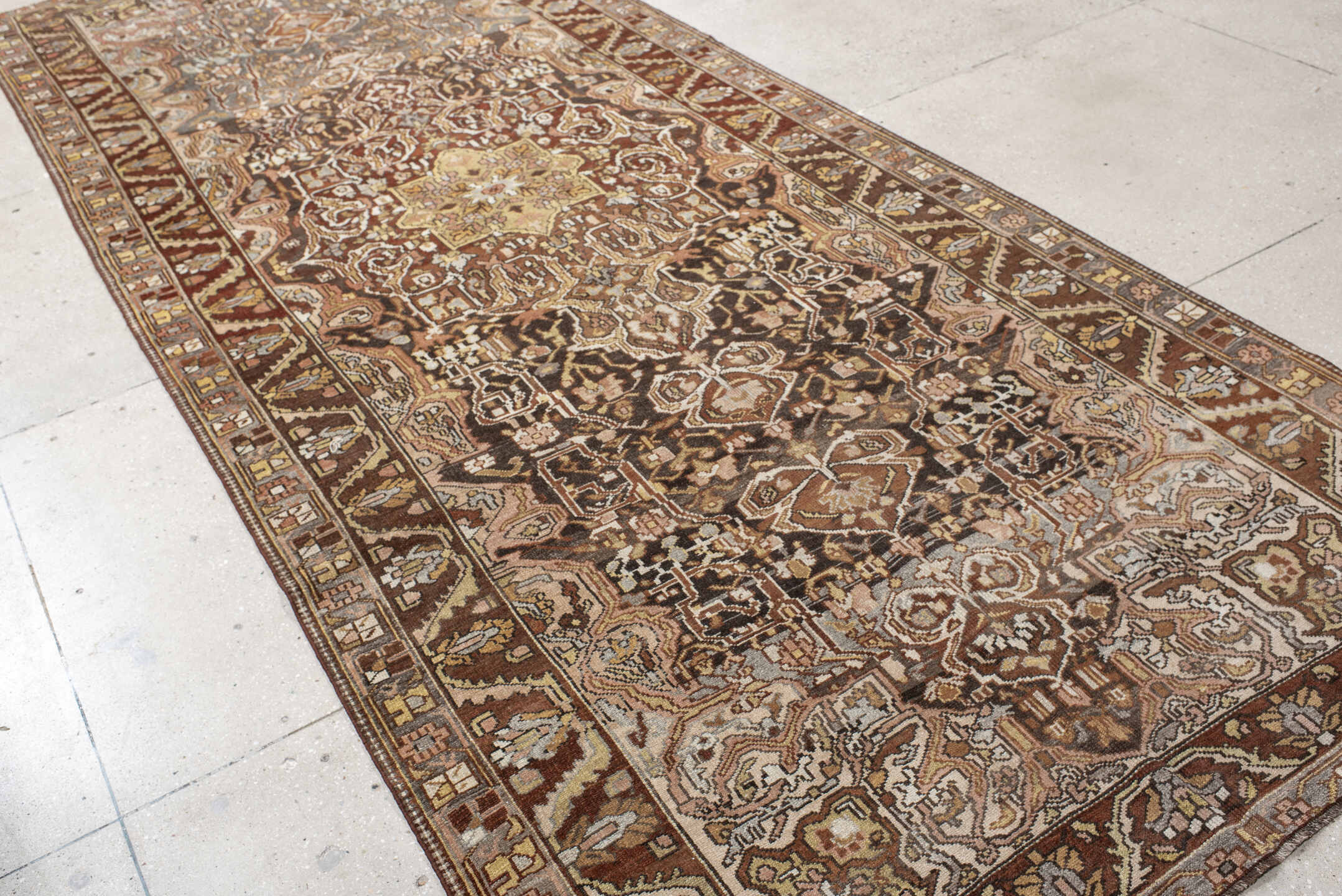 5' x 13' one-of-a-kind handmade vintage Baktiary rug. Color palette: brown, ivory, taupe, camel, charcoal, rust, sage, rose