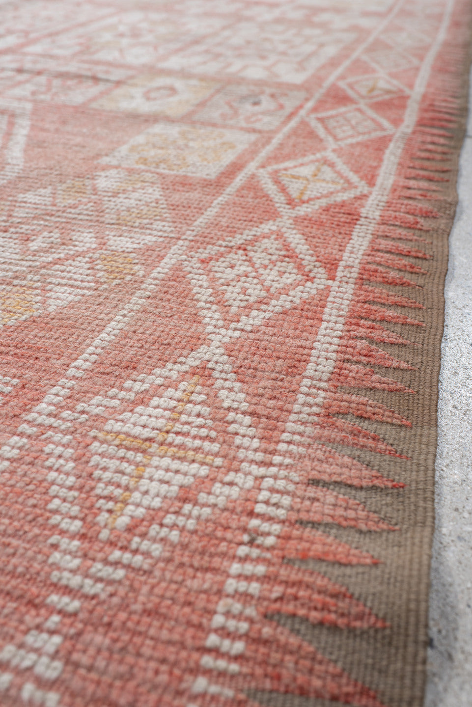 5' x 14' one-of-a-kind handmade vintage Moroccan runner rug. Color palette: brown, gray, light gray, off-white, orange, pink
