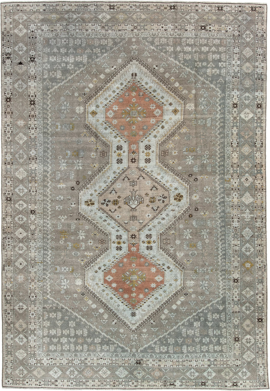 6' x 10' one-of-a-kind handmade antique Qashqai large size rug. Color palette: taupe, ivory, camel, rose, gold, brown, cream
