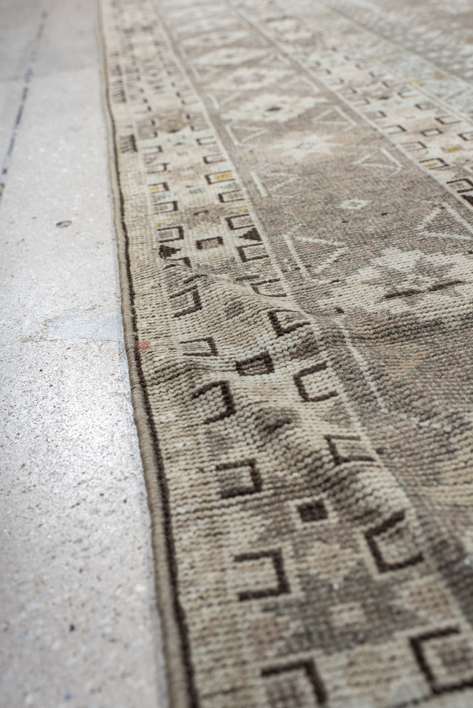 6' x 10' one-of-a-kind handmade antique Qashqai large size rug. Color palette: taupe, ivory, camel, rose, gold, brown, cream