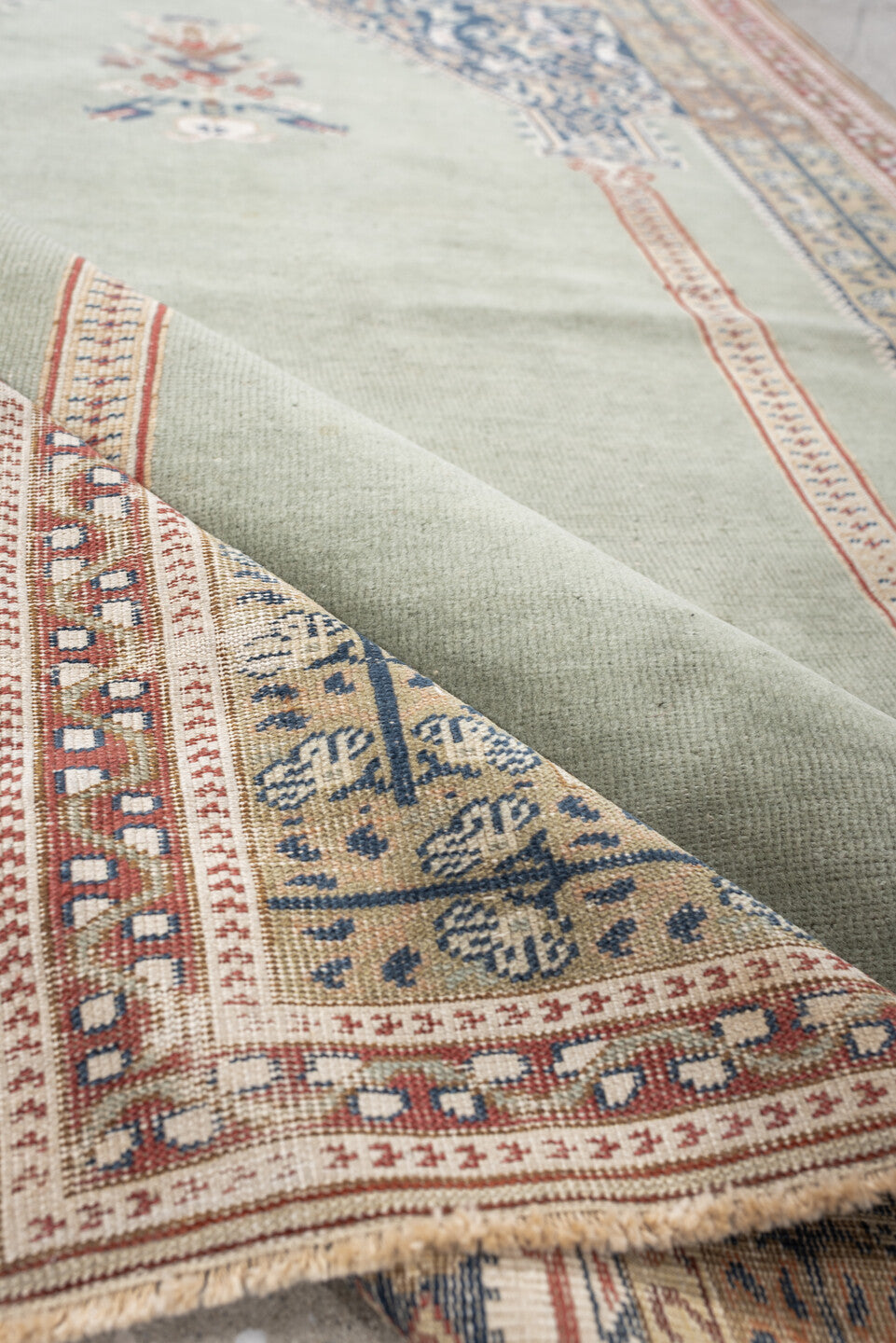 3' x 5' one-of-a-kind handmade antique Anatolian small size rug. Color palette: sage, ivory, indigo, terracotta, camel