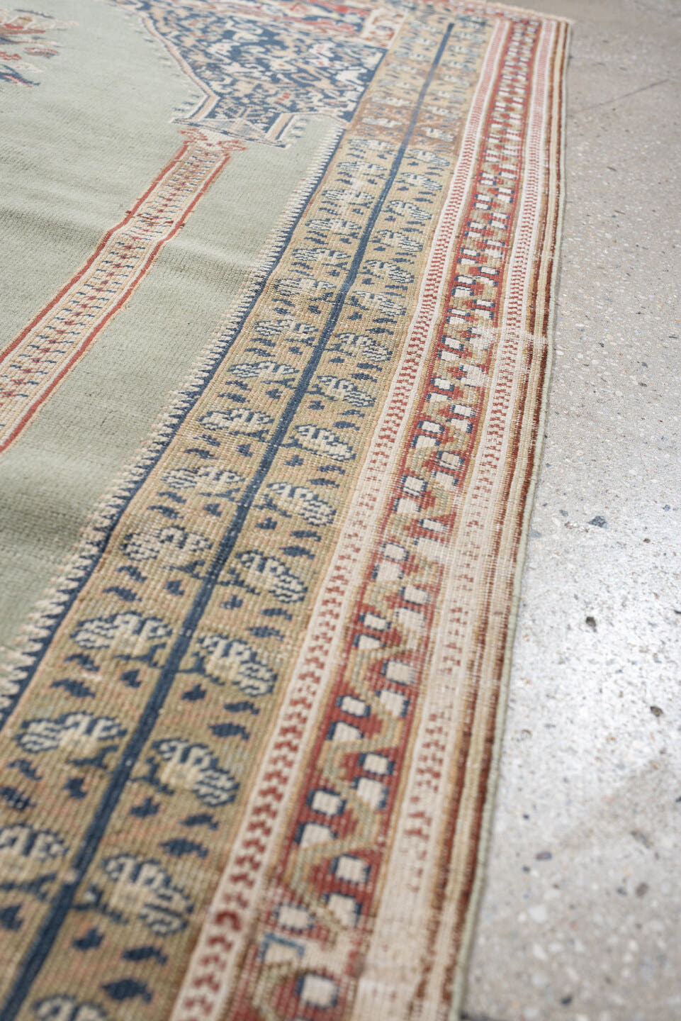 3' x 5' one-of-a-kind handmade antique Anatolian small size rug. Color palette: sage, ivory, indigo, terracotta, camel
