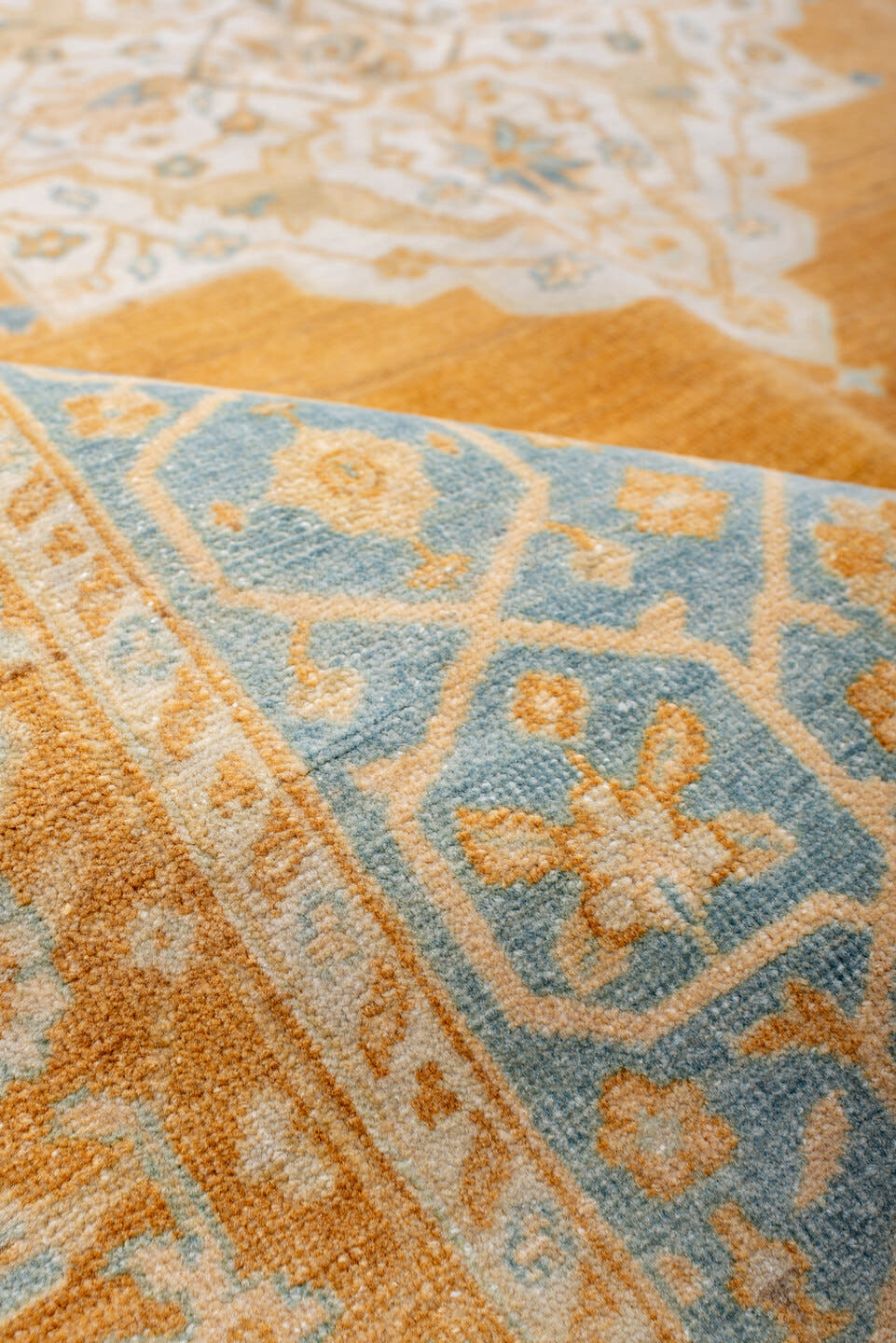 5' x 8' one-of-a-kind handmade antique Oushak medium size rug. Color palette: apricot, pale blue, ivory, cream, gold, camel