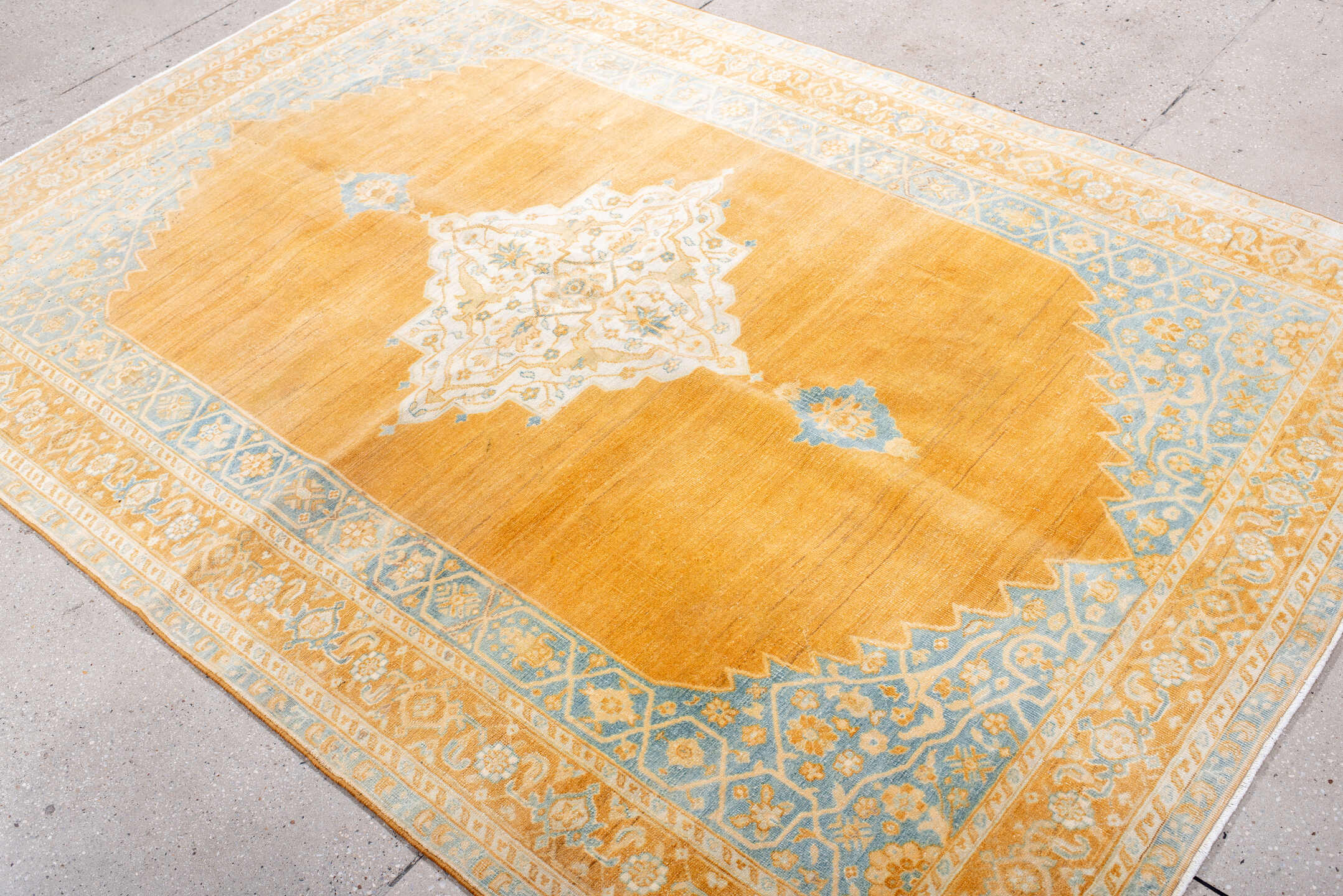 5' x 8' one-of-a-kind handmade antique Oushak medium size rug. Color palette: apricot, pale blue, ivory, cream, gold, camel