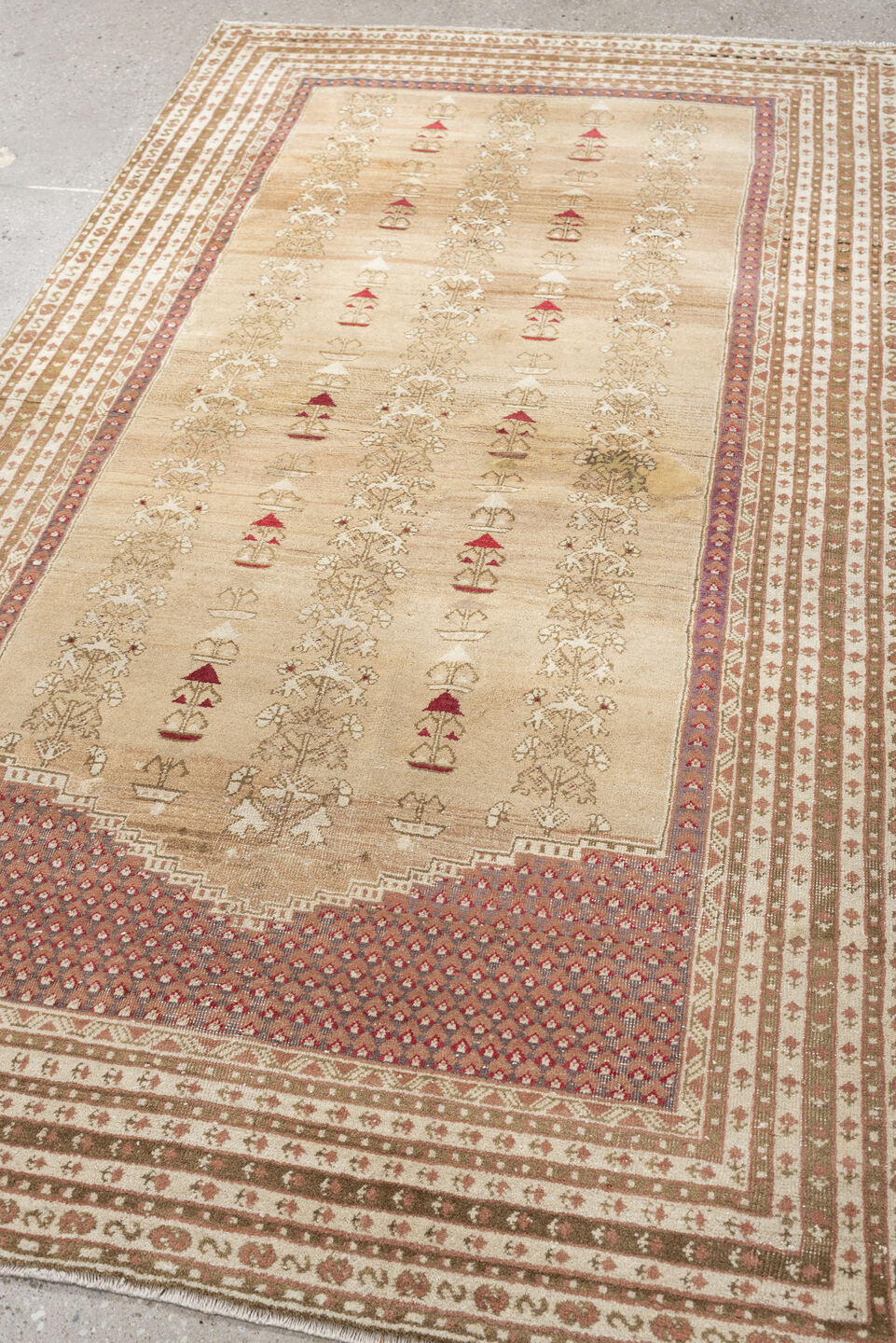 4' x 6' one-of-a-kind handmade antique Anatolian rug. Color palette: ivory, sand, terracotta, rose, taupe, camel, brick