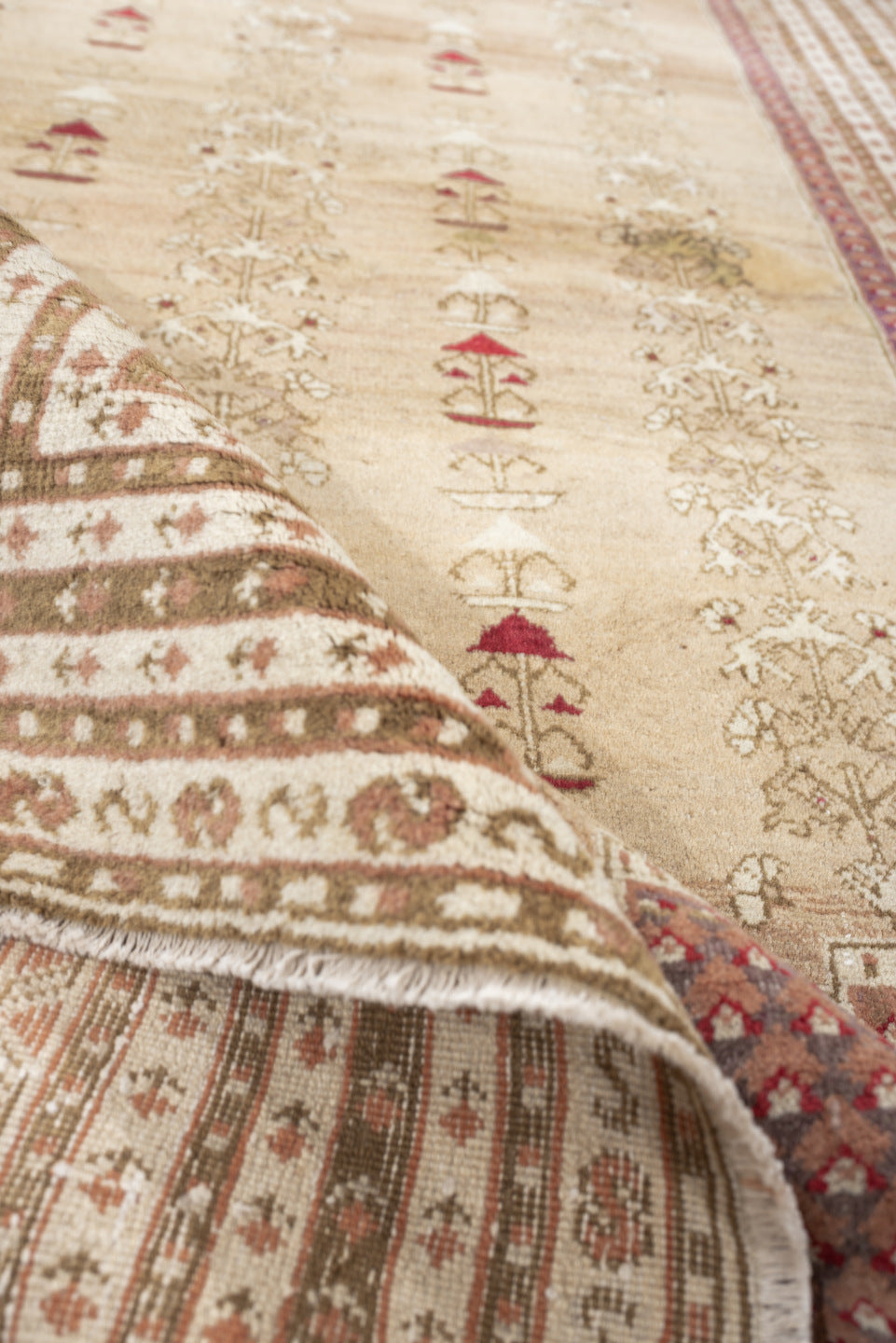 4' x 6' one-of-a-kind handmade antique Anatolian rug. Color palette: ivory, sand, terracotta, rose, taupe, camel, brick