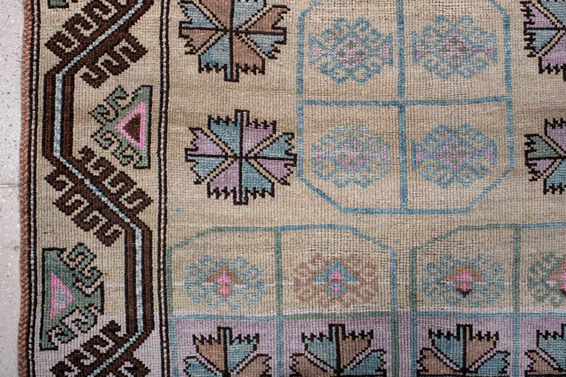 3' x 6' one-of-a-kind handmade antique Belouch small size rug. Color palette: ivory, lilac, brown, aqua, sage, taupe, pink