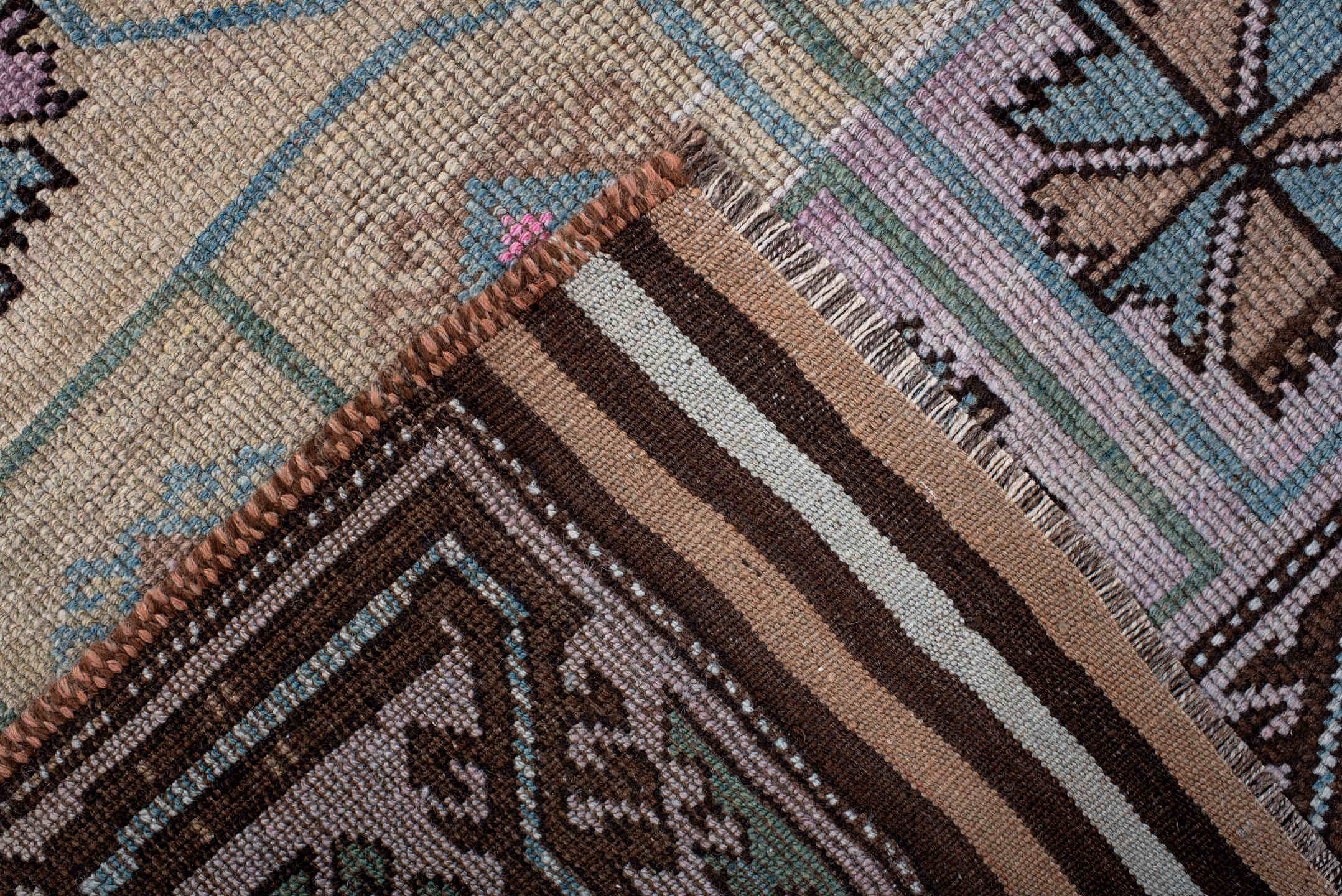 3' x 6' one-of-a-kind handmade antique Belouch small size rug. Color palette: ivory, lilac, brown, aqua, sage, taupe, pink