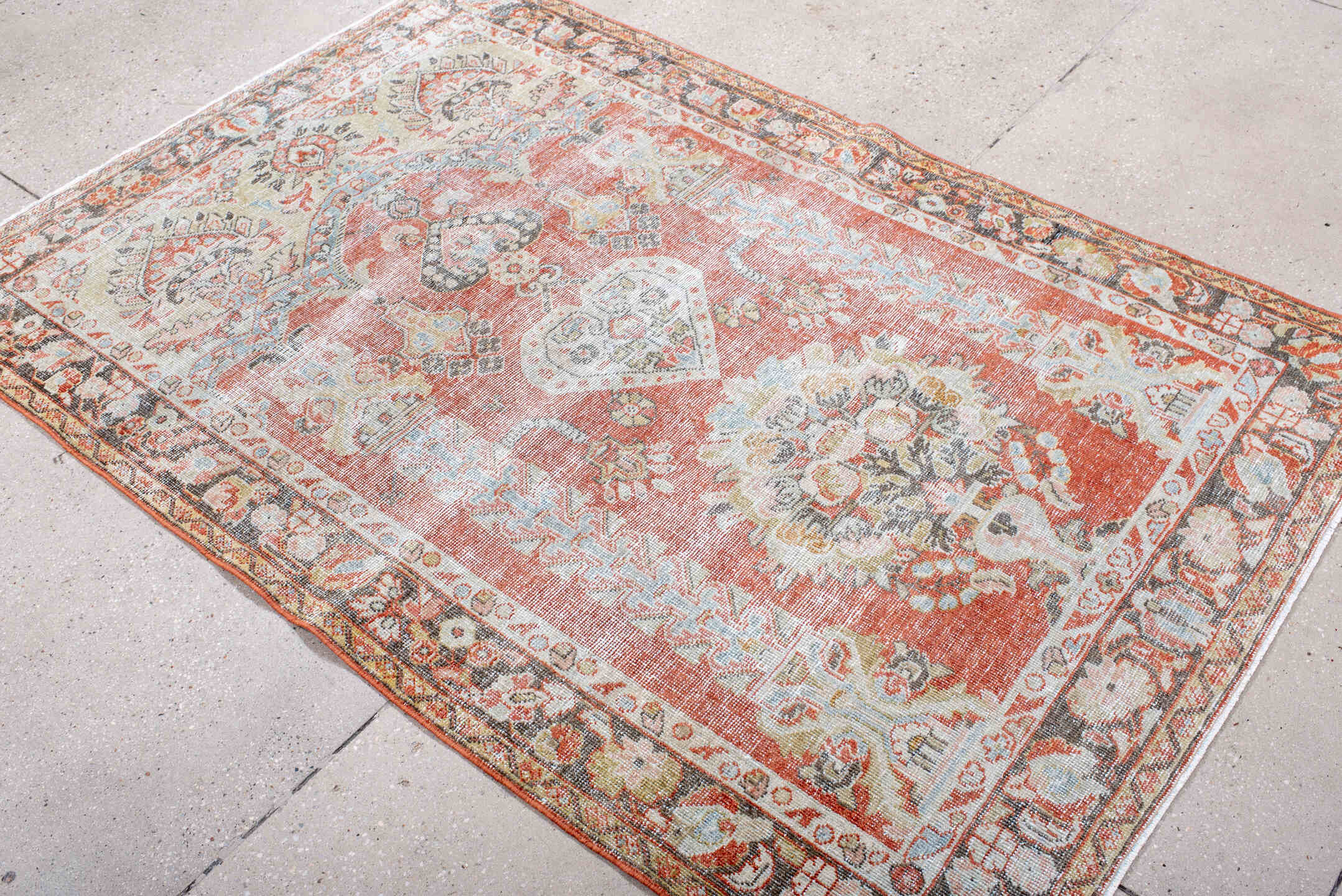 4' x 6' one-of-a-kind handmade vintage Mahal small size rug. Color palette: terra cotta, ivory, pale blue, charcoal, gold