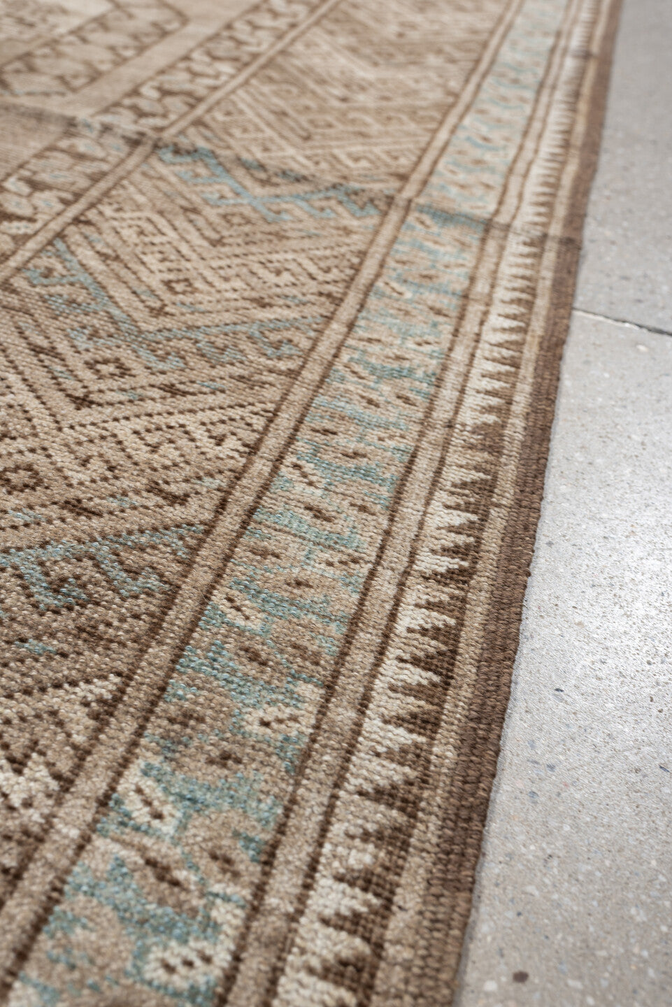 7' x 4' one-of-a-kind handmade vintage Afghan rug. Color palette: ivory, camel, taupe, light blue, brown, beige, gray