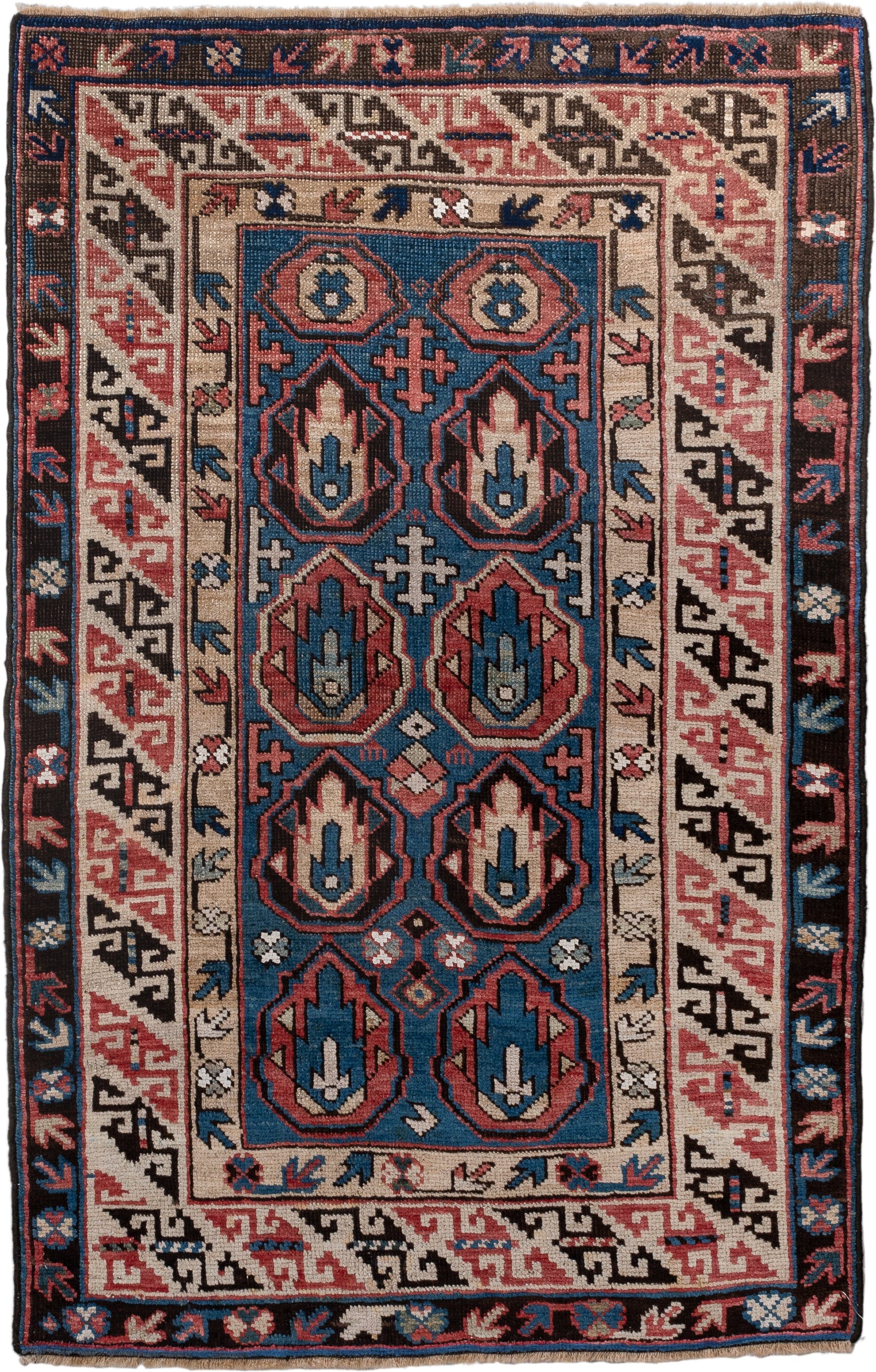 2' x 4' one-of-a-kind handmade vintage Caucasian small size rug. Color palette: blue, ivory, rust, brown, navy, pink, black