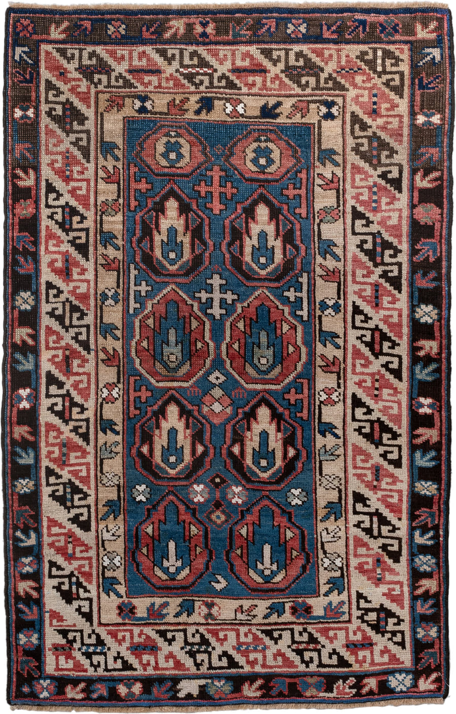 2' x 4' one-of-a-kind handmade vintage Caucasian small size rug. Color palette: blue, ivory, rust, brown, navy, pink, black