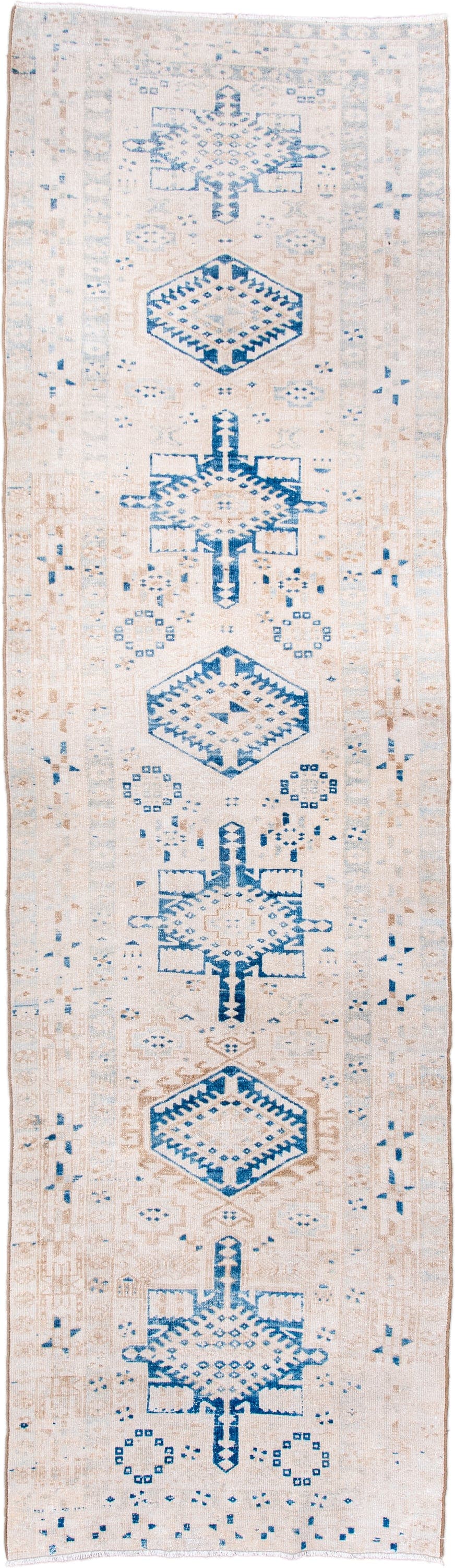 3' x 10' one-of-a-kind handmade antique Karaje runner rug. Color palette: ivory, sky blue, beige, camel, taupe, light blue