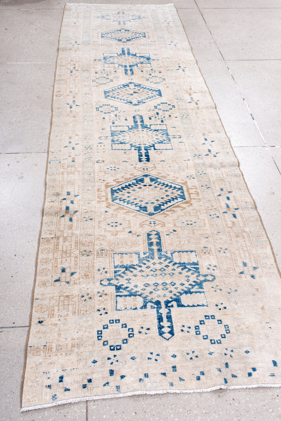 3' x 10' one-of-a-kind handmade antique Karaje runner rug. Color palette: ivory, sky blue, beige, camel, taupe, light blue