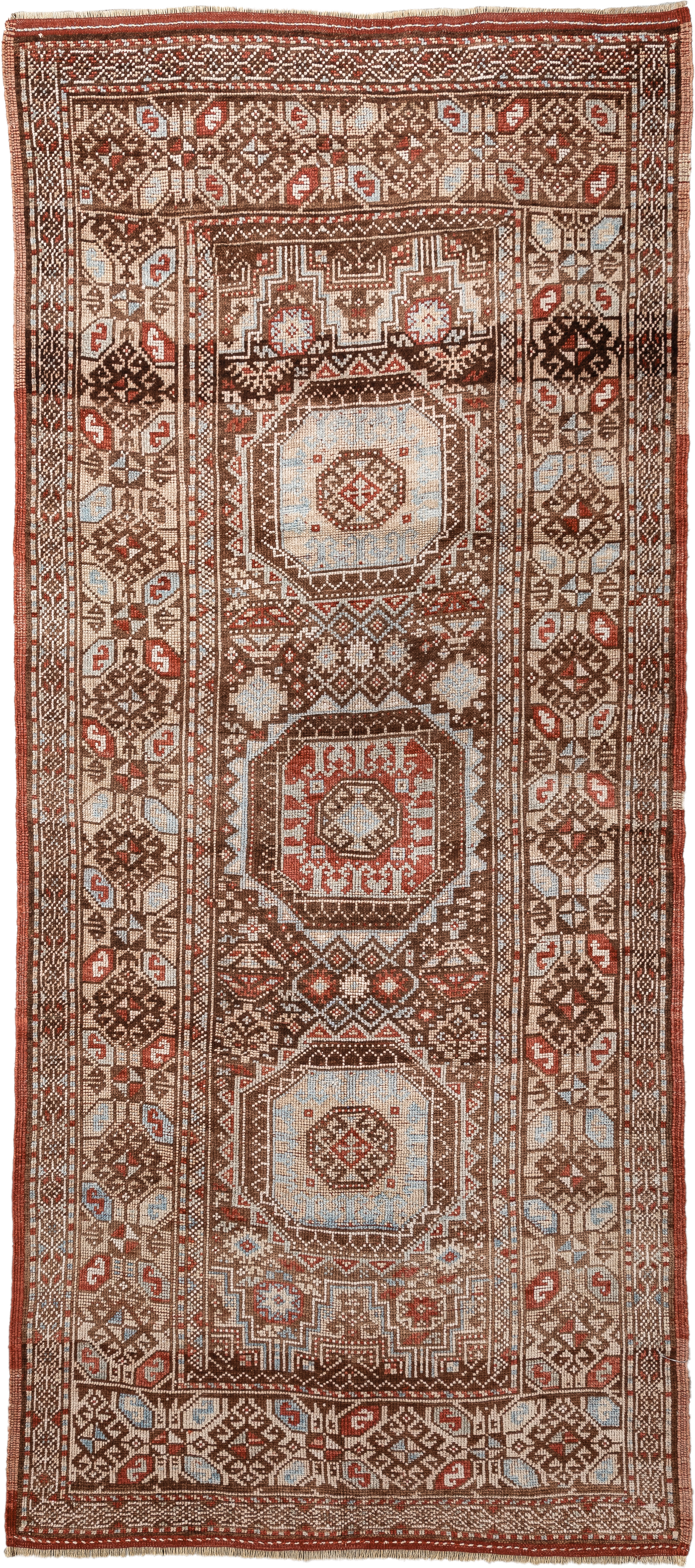 3' x 7' one-of-a-kind handmade antique Anatolian runner rug. Color palette: brown, ivory, rust, light blue, taupe