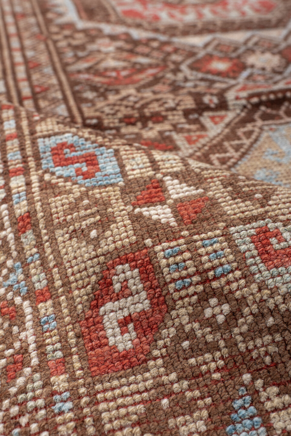 3' x 7' one-of-a-kind handmade antique Anatolian runner rug. Color palette: brown, ivory, rust, light blue, taupe