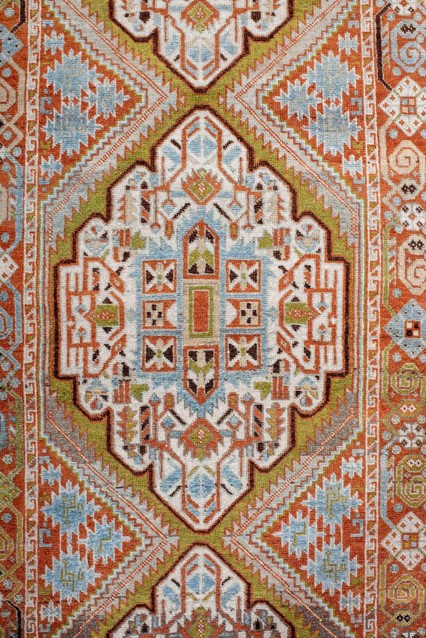 2' x 6' one-of-a-kind handmade vintage Afshar runner rug. Color palette: terra cotta, ivory, sky blue, olive, rust, charcoal