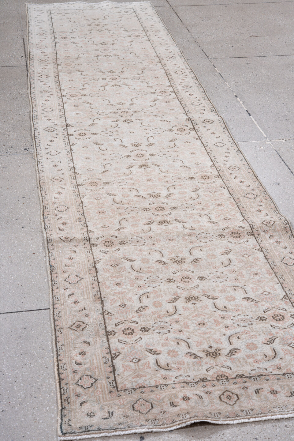 2' x 11' one-of-a-kind handmade vintage Indosaraban runner rug. Color palette: ivory, blush, taupe, charcoal, rose, beige