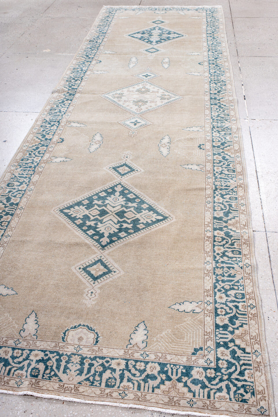 4' x 13' one-of-a-kind handmade antique Sivas runner rug. Color palette: camel, ivory, teal, beige, taupe, cream, gray