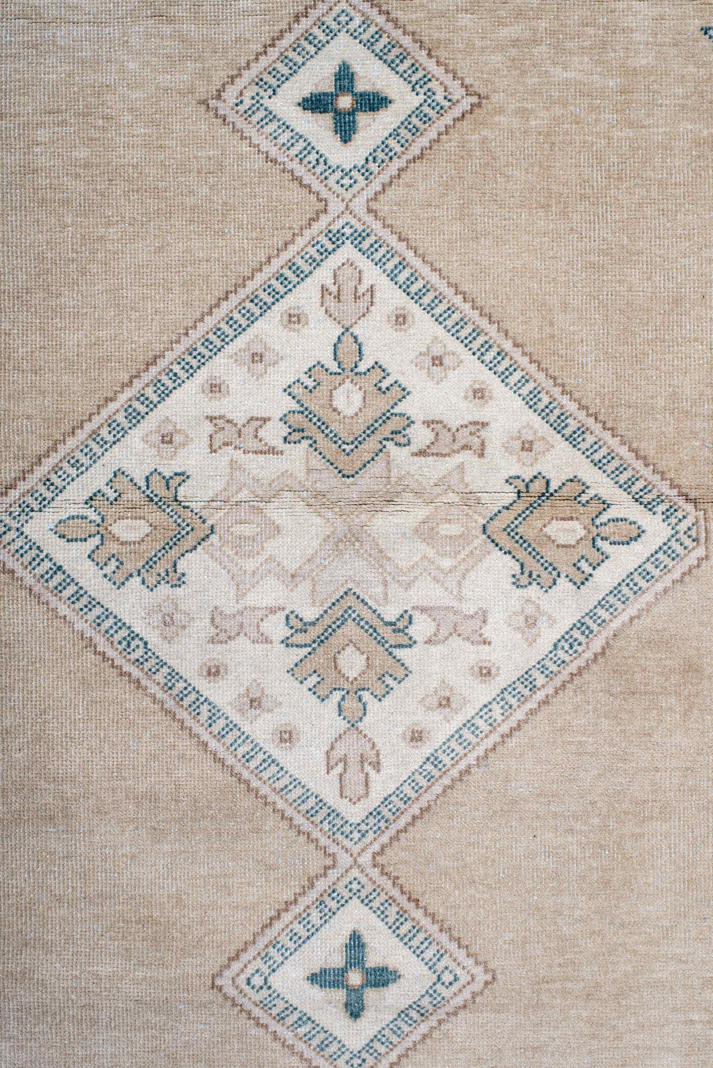 4' x 13' one-of-a-kind handmade antique Sivas runner rug. Color palette: camel, ivory, teal, beige, taupe, cream, gray
