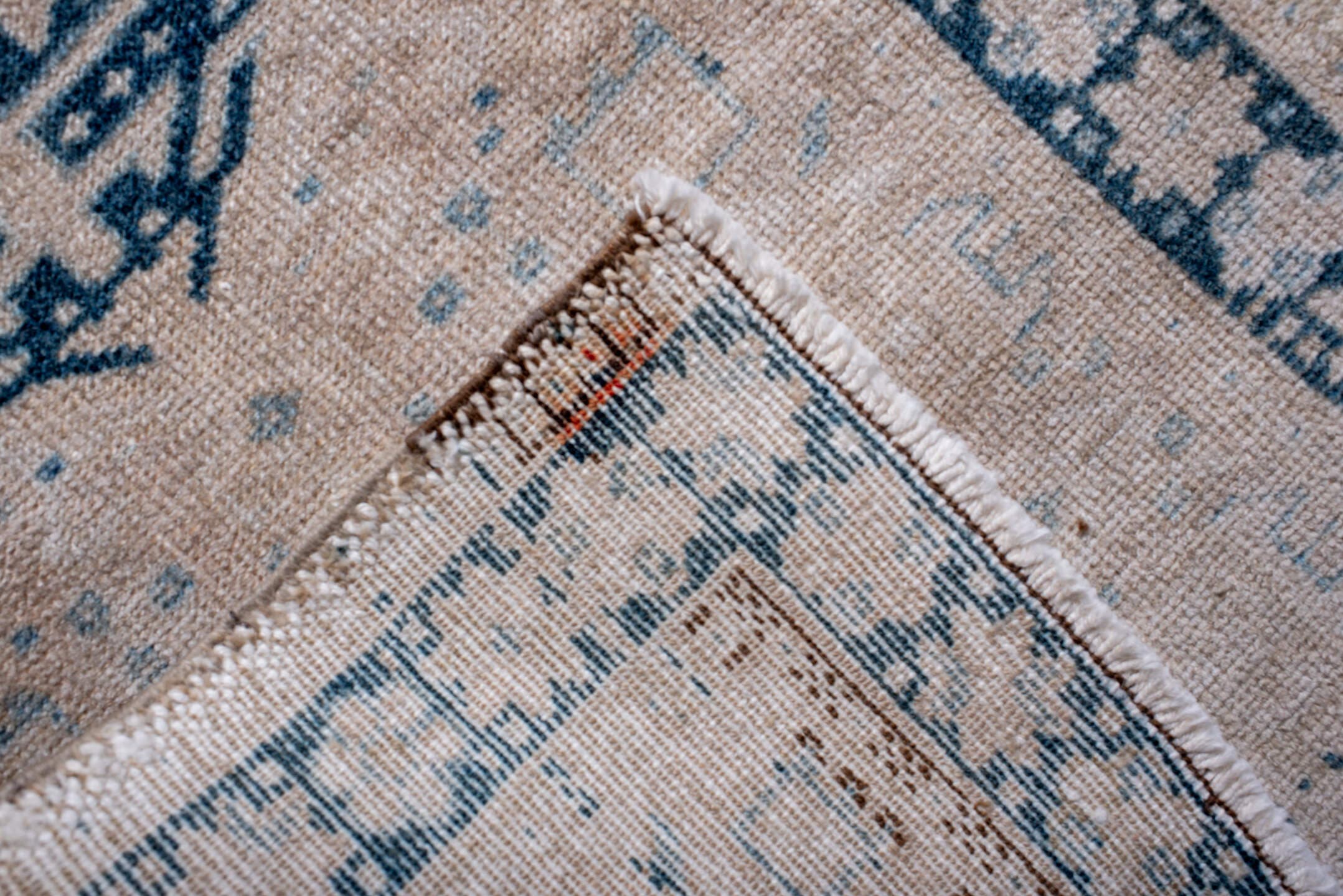 2' x 6' one-of-a-kind handmade antique Karaje runner rug. Color palette: ivory, sky blue, indigo, camel, taupe, brown
