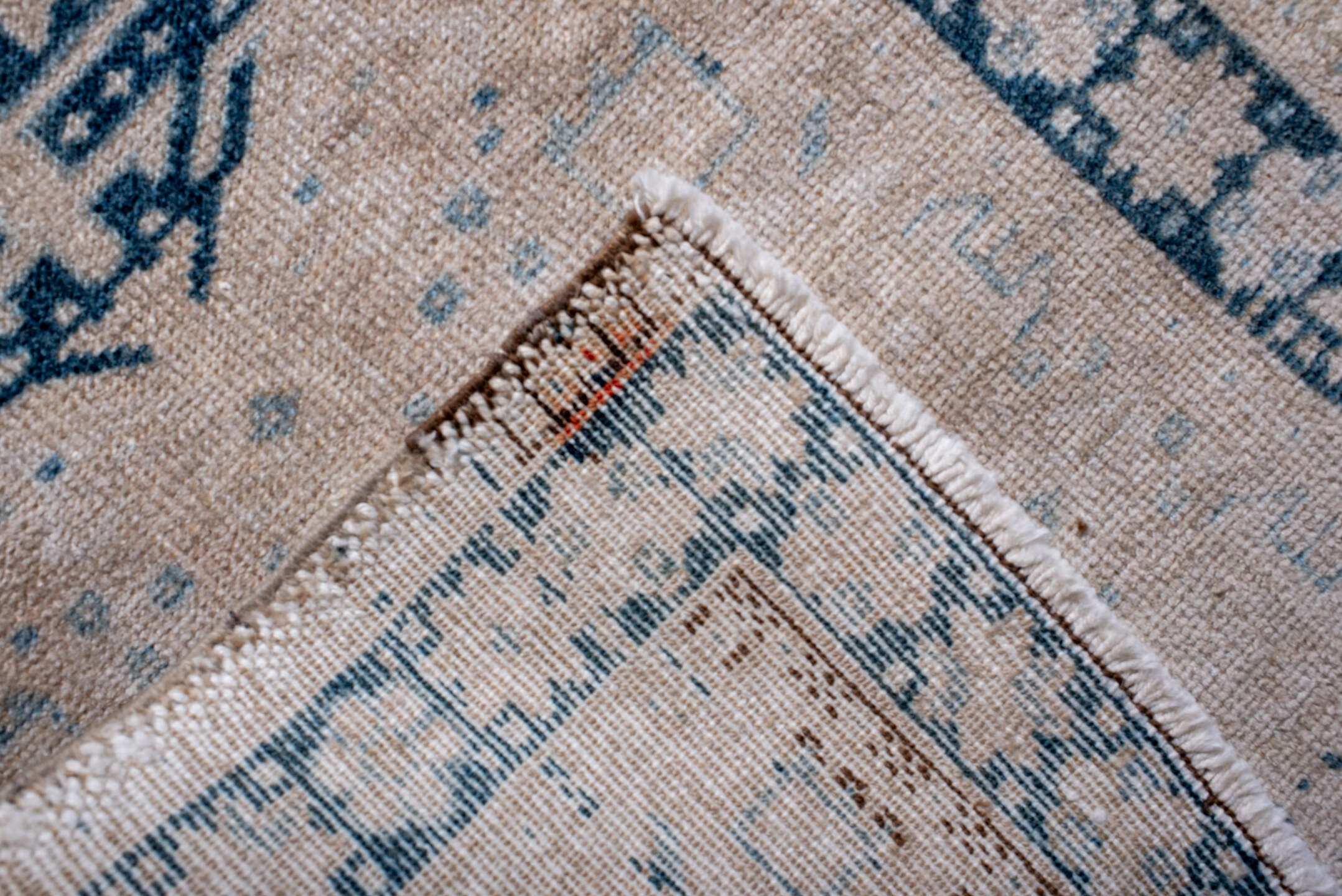 2' x 6' one-of-a-kind handmade antique Karaje runner rug. Color palette: ivory, sky blue, indigo, camel, taupe, brown