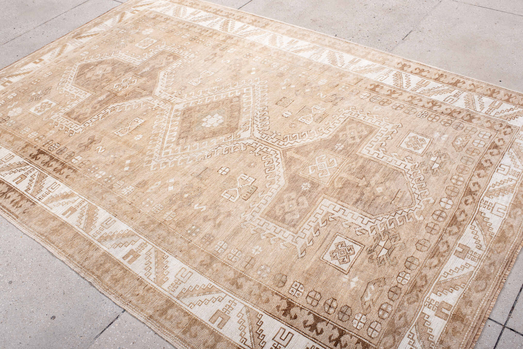 5' x 8' one-of-a-kind handmade antique Kars medium size rug. Color palette: beige, ivory, taupe, camel, sand, brown, gray