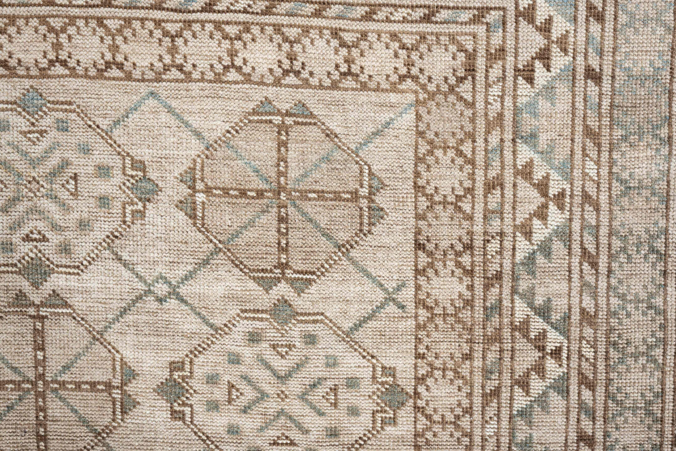6' x 3' one-of-a-kind handmade antique Afghan rug. Color palette: ivory, taupe, pale blue, beige, camel, light brown, gray
