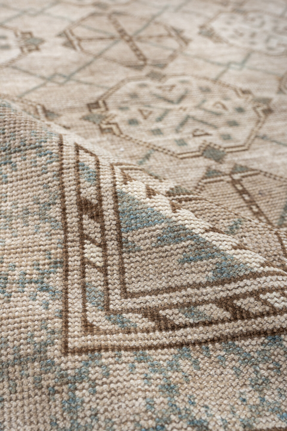 6' x 3' one-of-a-kind handmade antique Afghan rug. Color palette: ivory, taupe, pale blue, beige, camel, light brown, gray