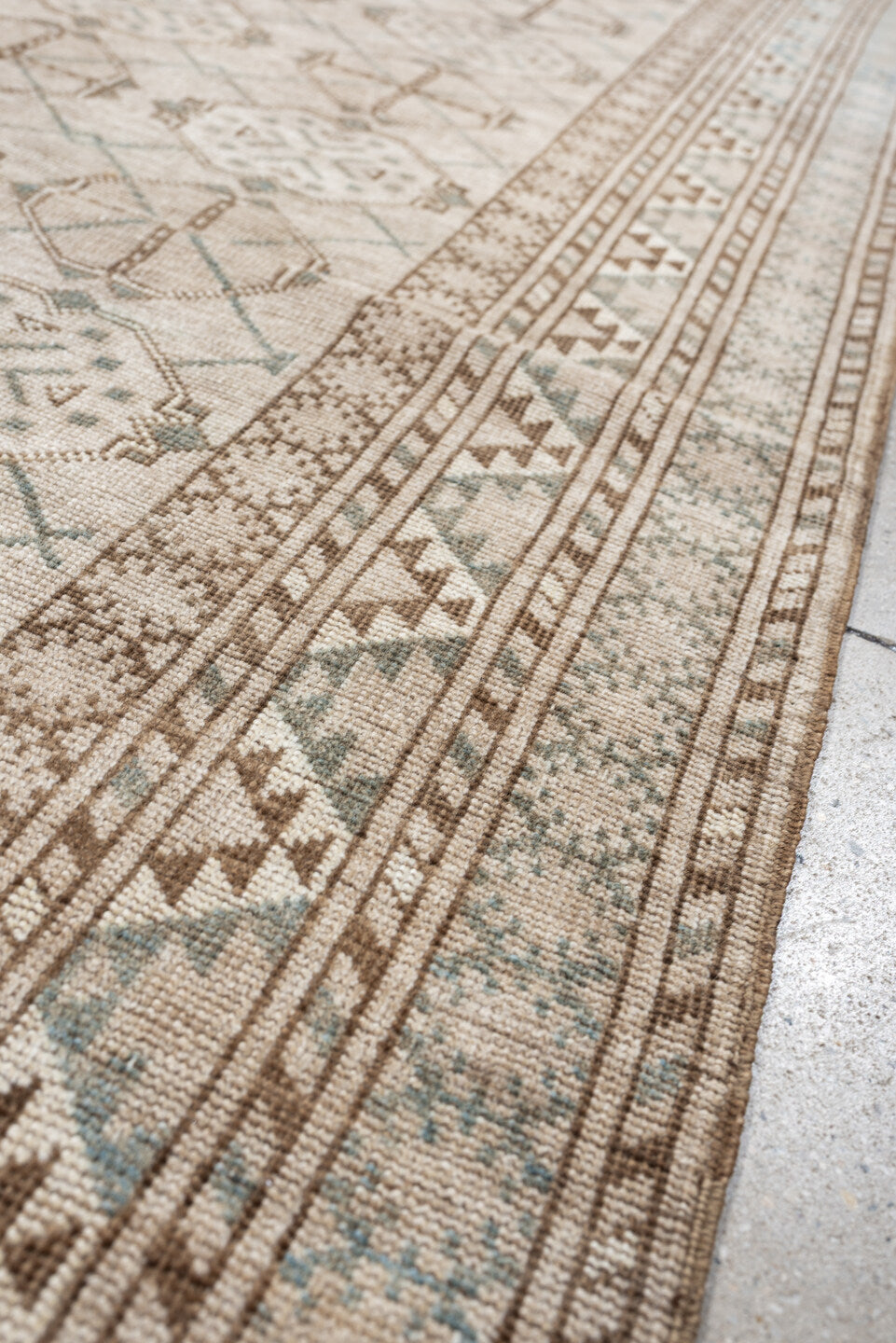 6' x 3' one-of-a-kind handmade antique Afghan rug. Color palette: ivory, taupe, pale blue, beige, camel, light brown, gray