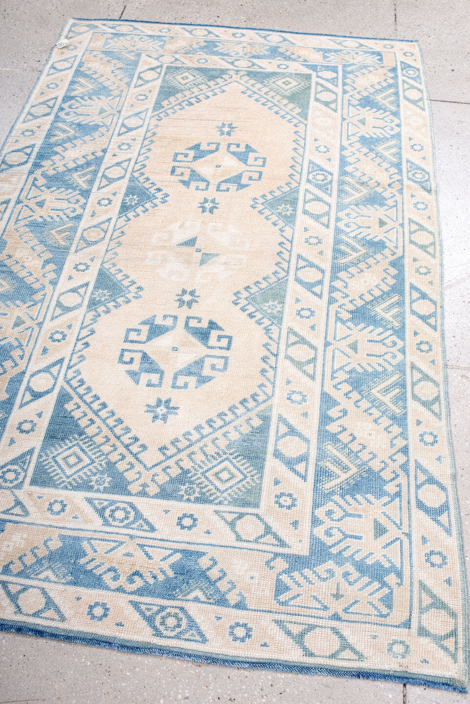 3' x 6' one-of-a-kind handmade antique Anatolian small size rug. Color palette: ivory, sky blue, powder blue, light blue
