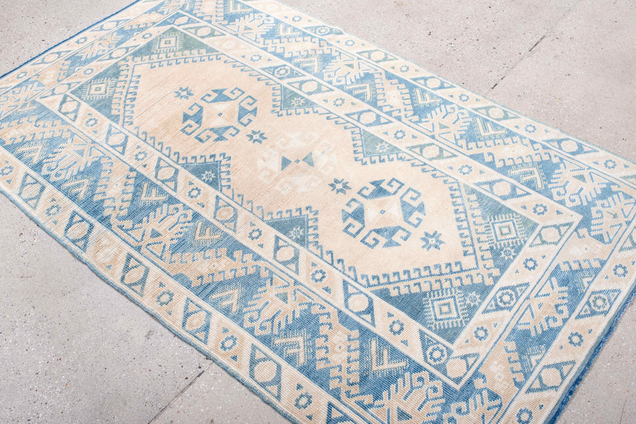 3' x 6' one-of-a-kind handmade antique Anatolian small size rug. Color palette: ivory, sky blue, powder blue, light blue