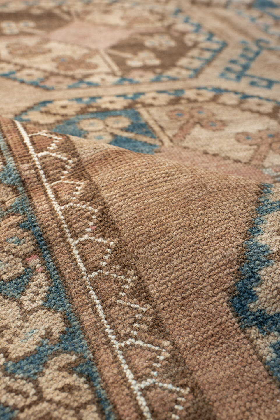 3' x 6' one-of-a-kind handmade antique Afghan small size rug. Color palette: camel, taupe, teal, ivory, rust, rose, brown