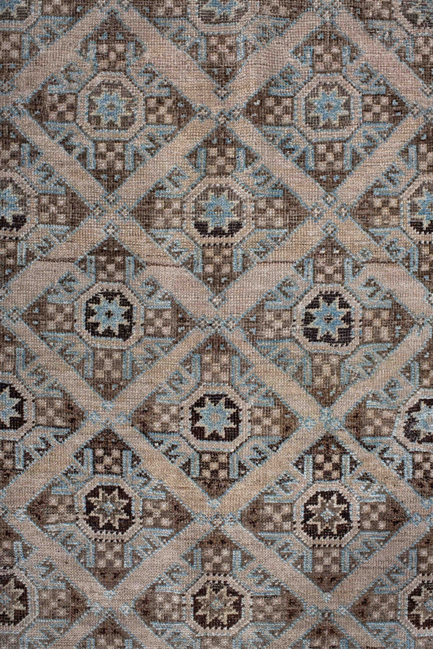 3' x 5' one-of-a-kind handmade antique Belouch small size rug. Color palette: brown, camel, ivory, sky blue, taupe, charcoal