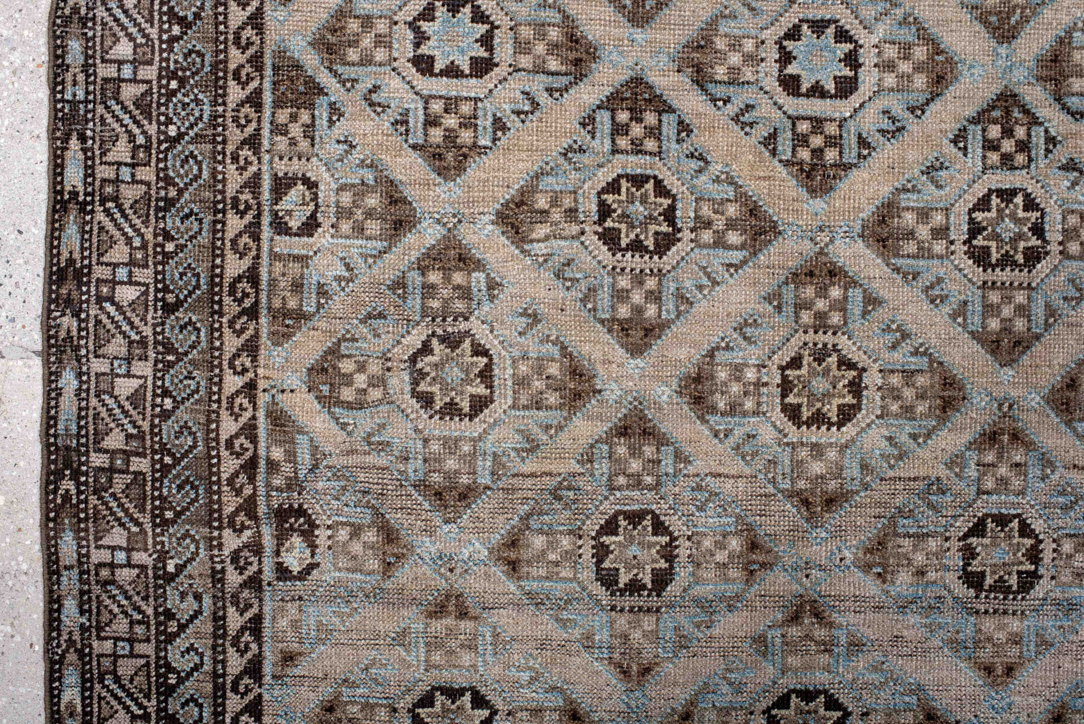 3' x 5' one-of-a-kind handmade antique Belouch small size rug. Color palette: brown, camel, ivory, sky blue, taupe, charcoal