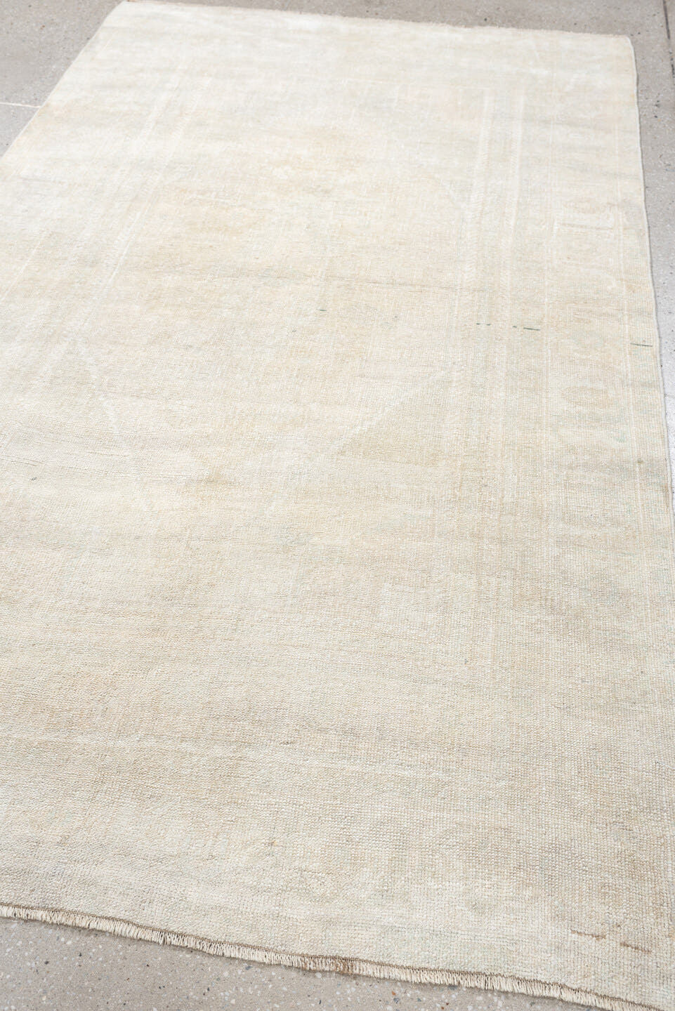 4' x 7' one-of-a-kind handmade antique Anatolian rug. Color palette: ivory, cream, taupe, pale sage, beige, gray, green