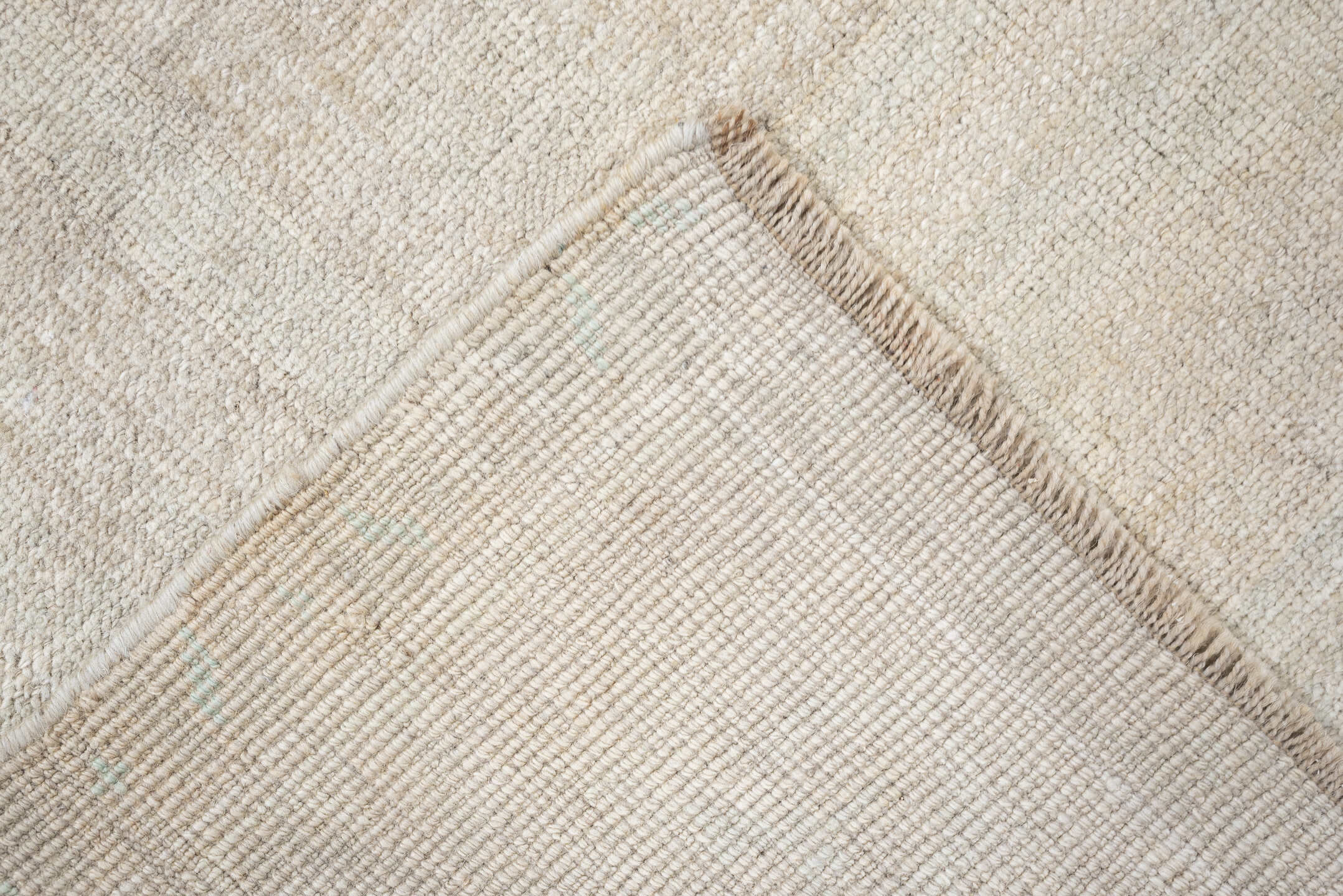 4' x 7' one-of-a-kind handmade antique Anatolian rug. Color palette: ivory, cream, taupe, pale sage, beige, gray, green