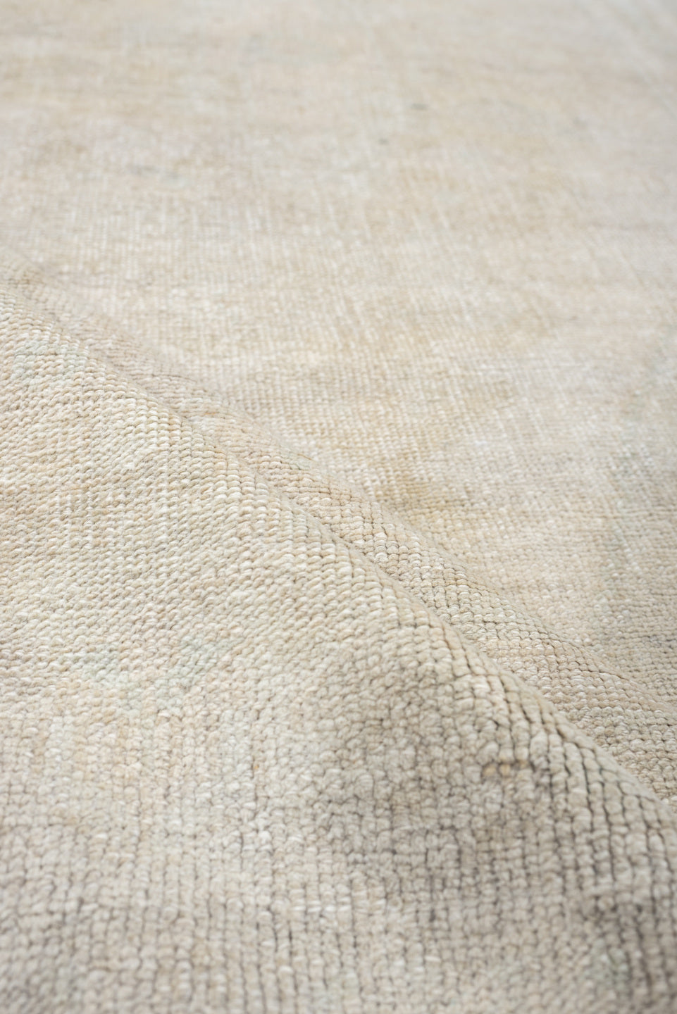 4' x 7' one-of-a-kind handmade antique Anatolian rug. Color palette: ivory, cream, taupe, pale sage, beige, gray, green