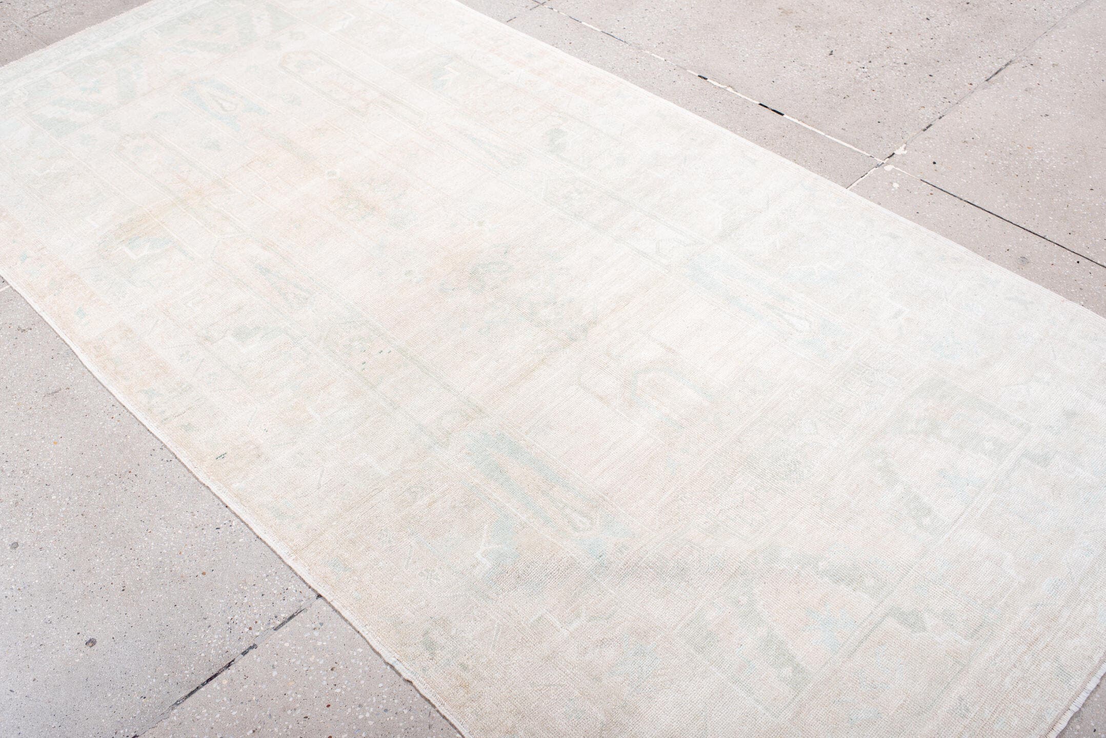 4' x 8' one-of-a-kind handmade antique Anatolian runner rug. Color palette: ivory, cream, pale blue, beige, taupe