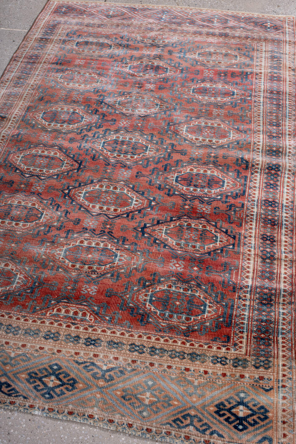 3' x 5' one-of-a-kind handmade antique Bokara small size rug. Color palette: terra cotta, indigo, ivory, rust, slate, cream