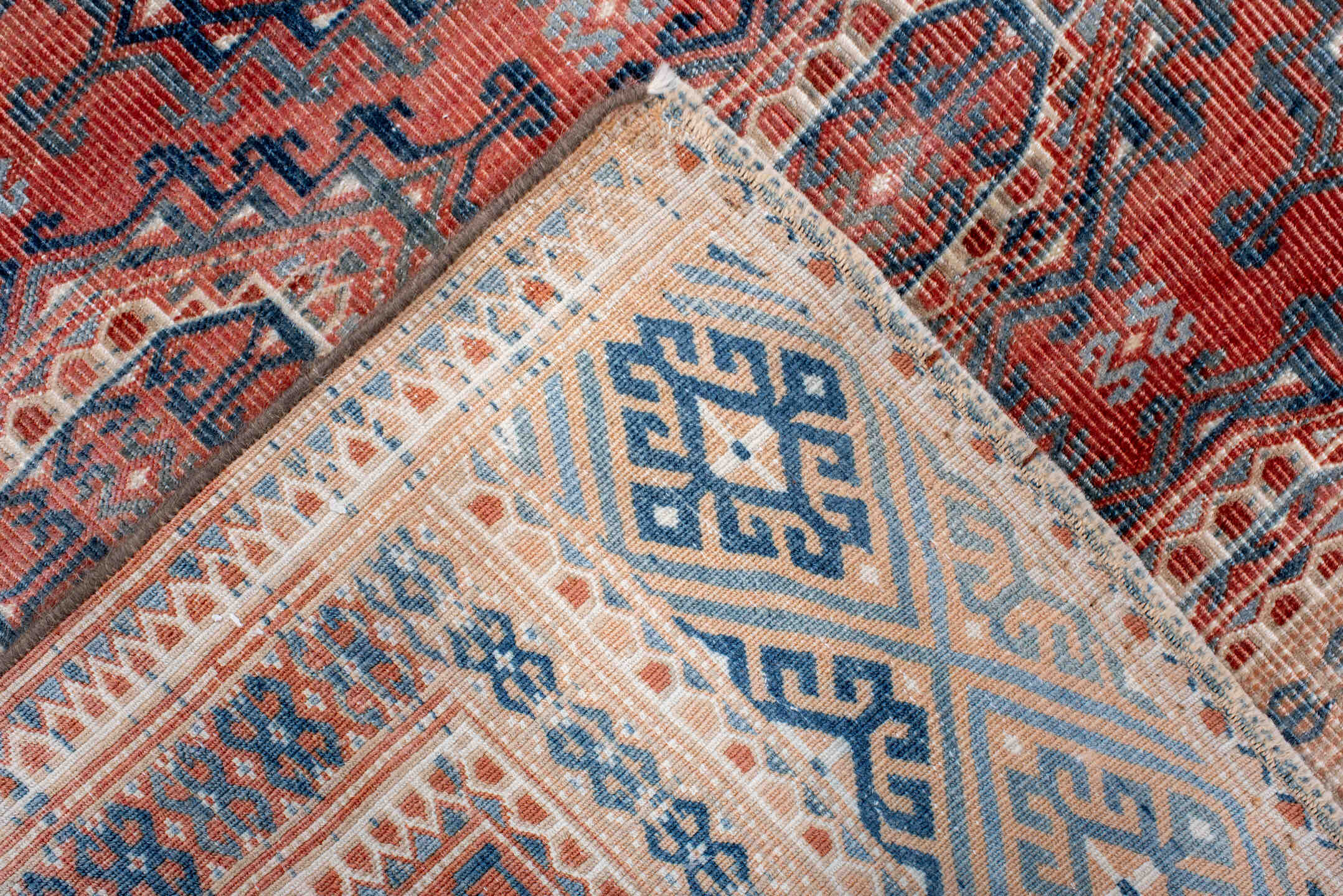 3' x 5' one-of-a-kind handmade antique Bokara small size rug. Color palette: terra cotta, indigo, ivory, rust, slate, cream