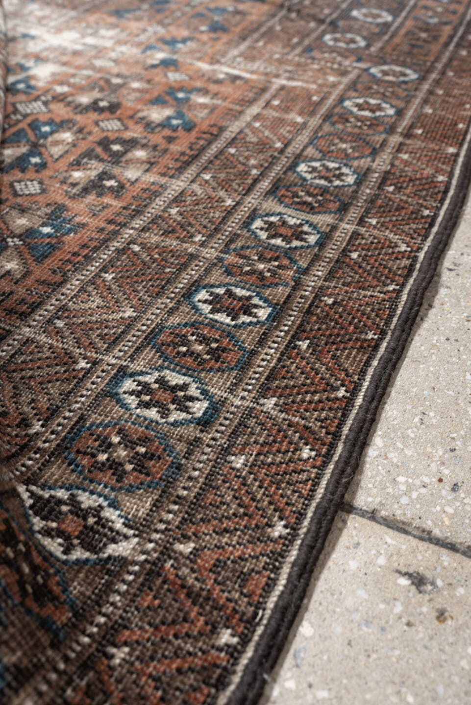 2' x 4' one-of-a-kind handmade antique Belouch small size rug. Color palette: rust, indigo, ivory, charcoal, camel, taupe
