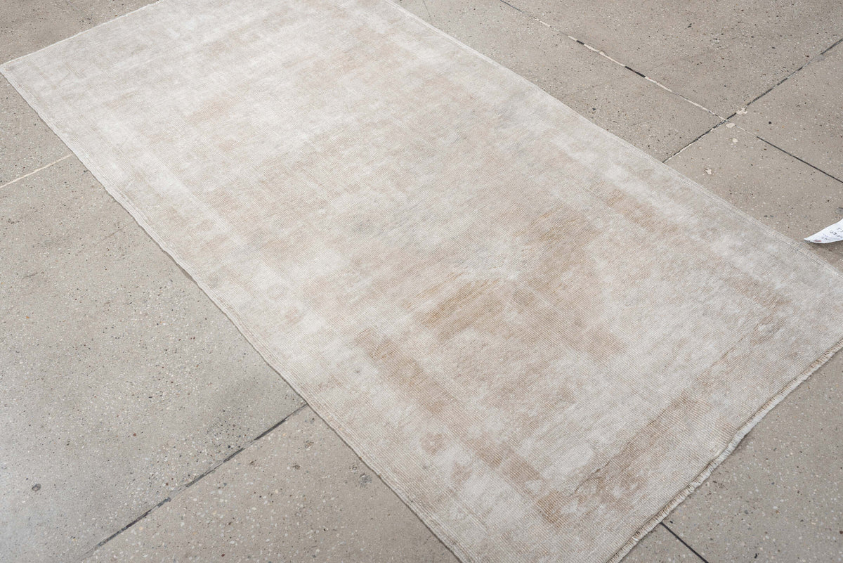 3' x 6' one-of-a-kind handmade antique Anatolian runner rug. Color palette: ivory, taupe, cream, beige, stone gray, gray